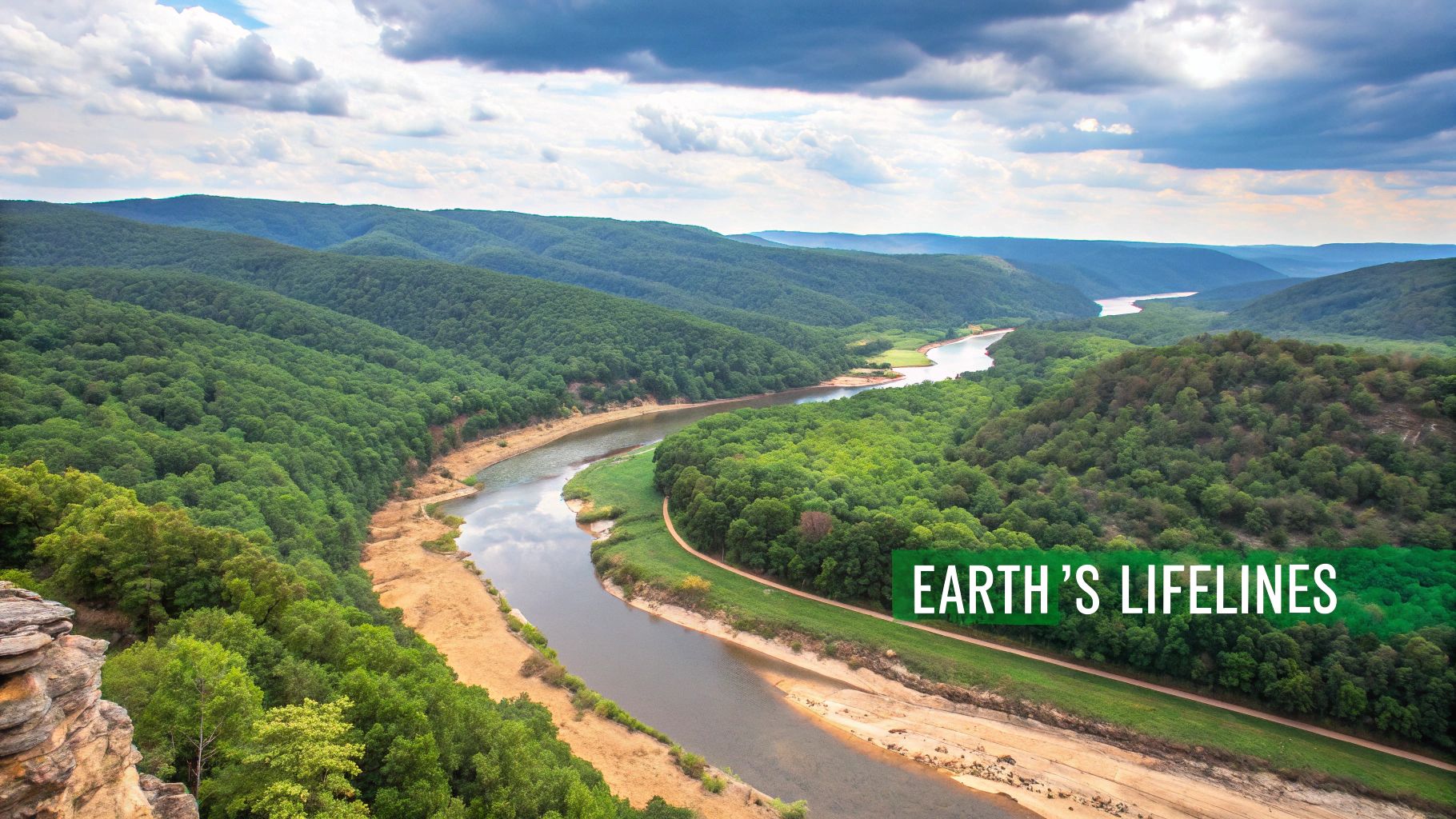 A wide, powerful river flowing through a lush green valley, illustrating its role as a lifeline for the surrounding ecosystem.