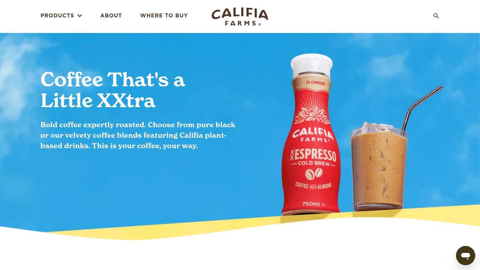 Califia Farms oat milk next to a cup of coffee
