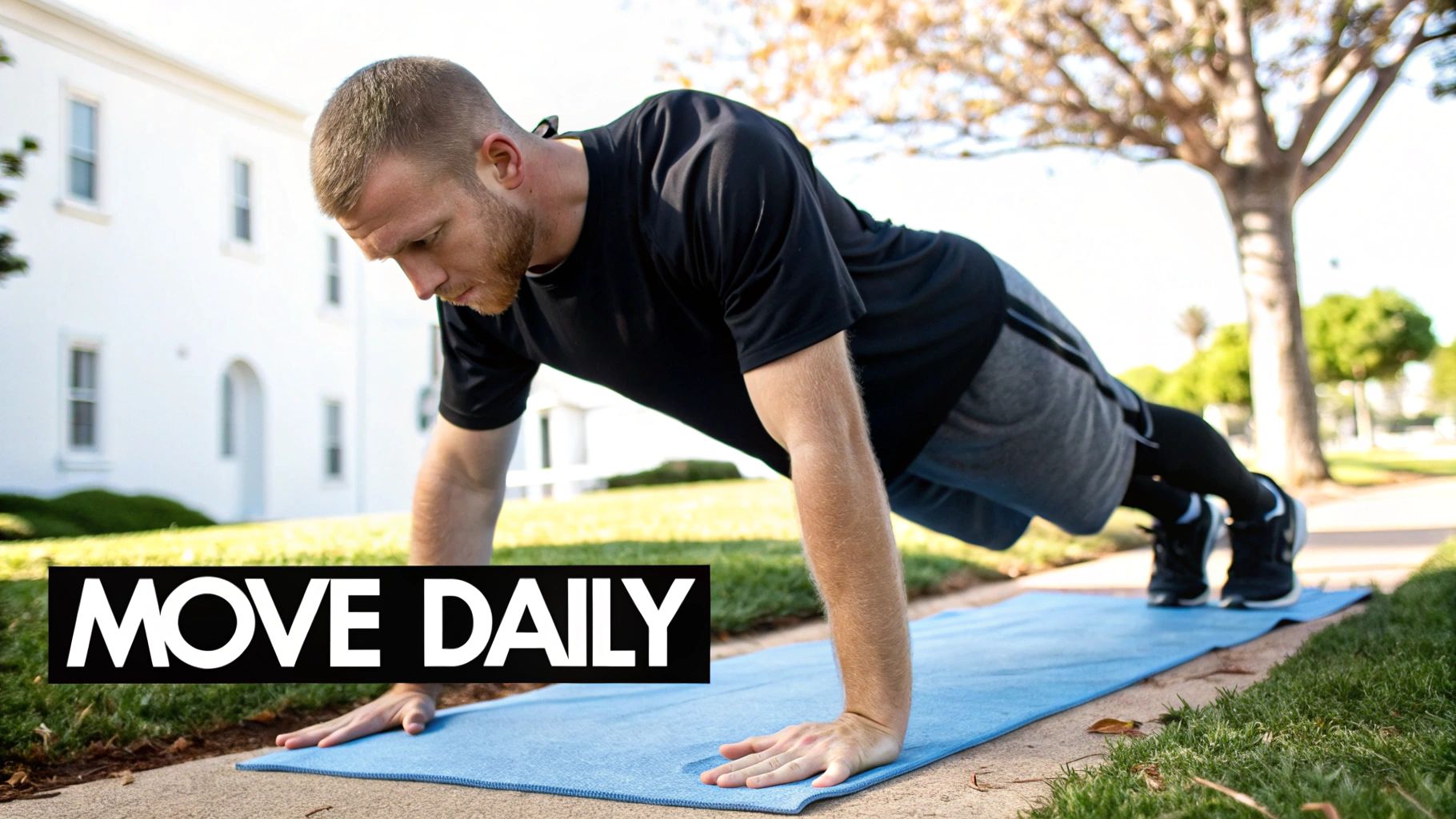 A man doing yoga stretches on a mat in a well-lit living room, part of his morning fitness routine.