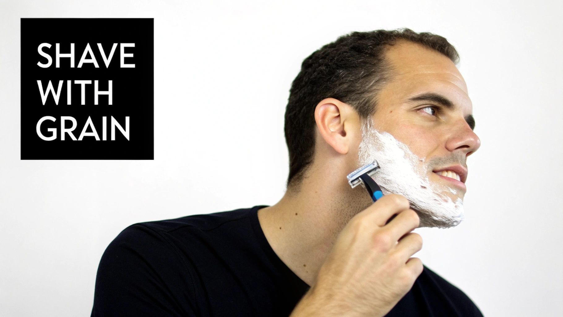 A man applying aftershave balm to his face in a well-lit bathroom, focusing on a smooth, irritation-free shave.