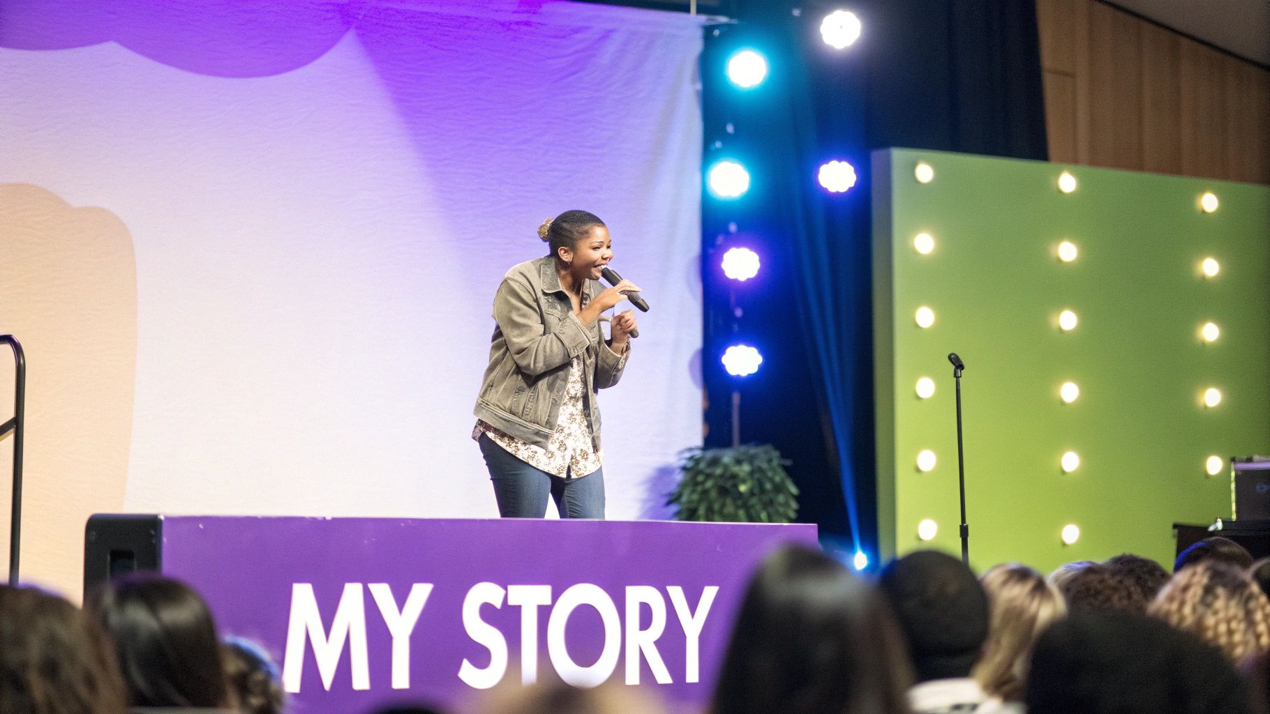 A person passionately telling a story to an engaged audience, illustrating the Personal Story Pitch.