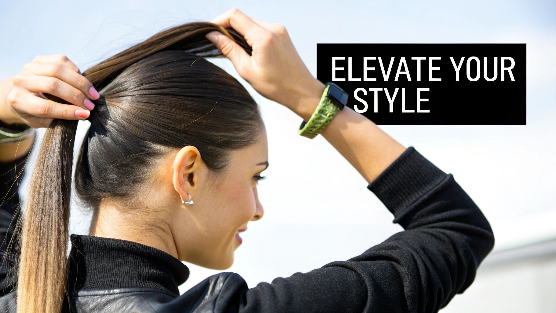 A woman smiling, showing off her perfectly styled hair.