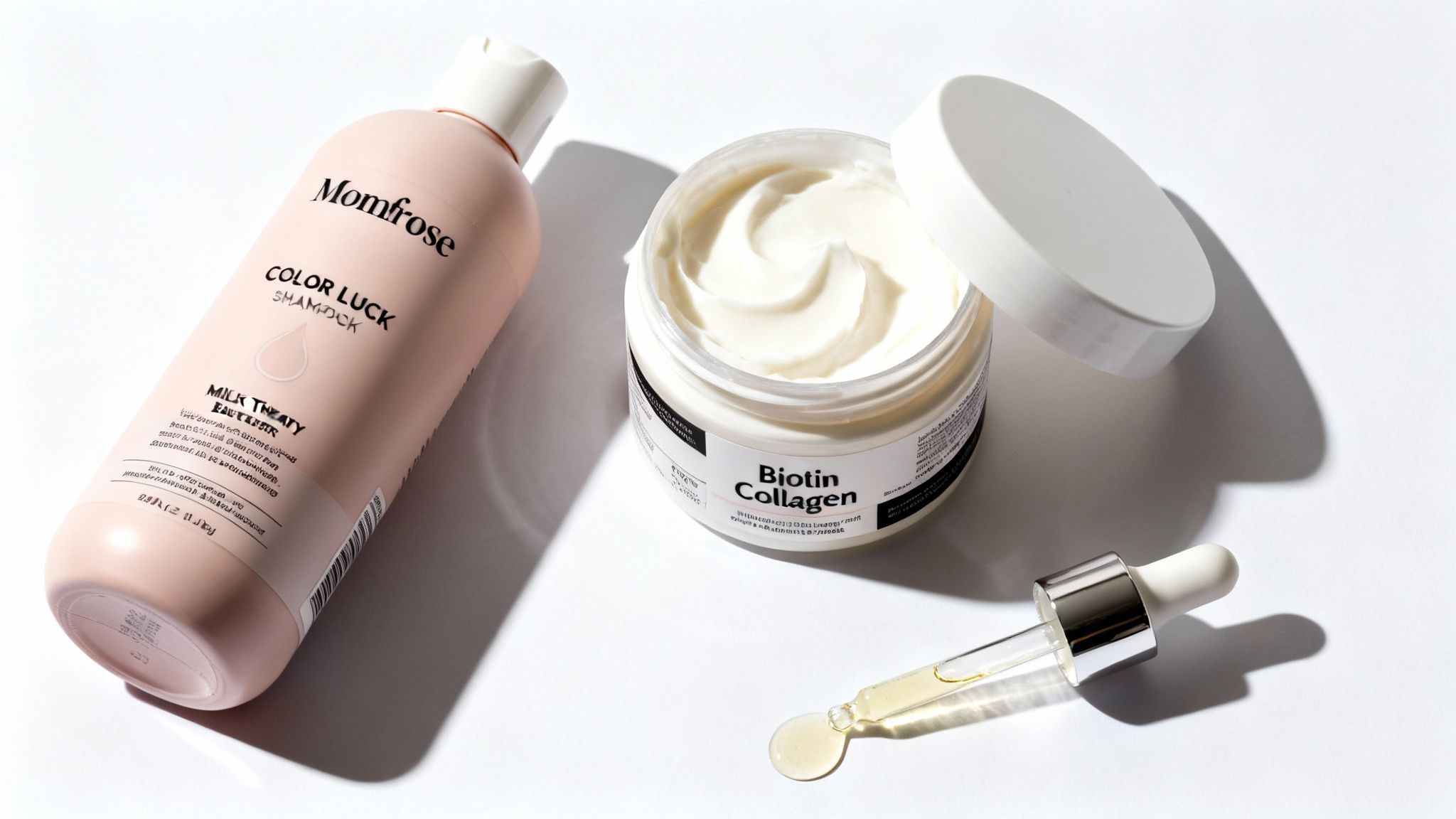 Assortment of hair care products including Momfrose Color Luck shampoo, Biotin Collagen mask, and hair oil.