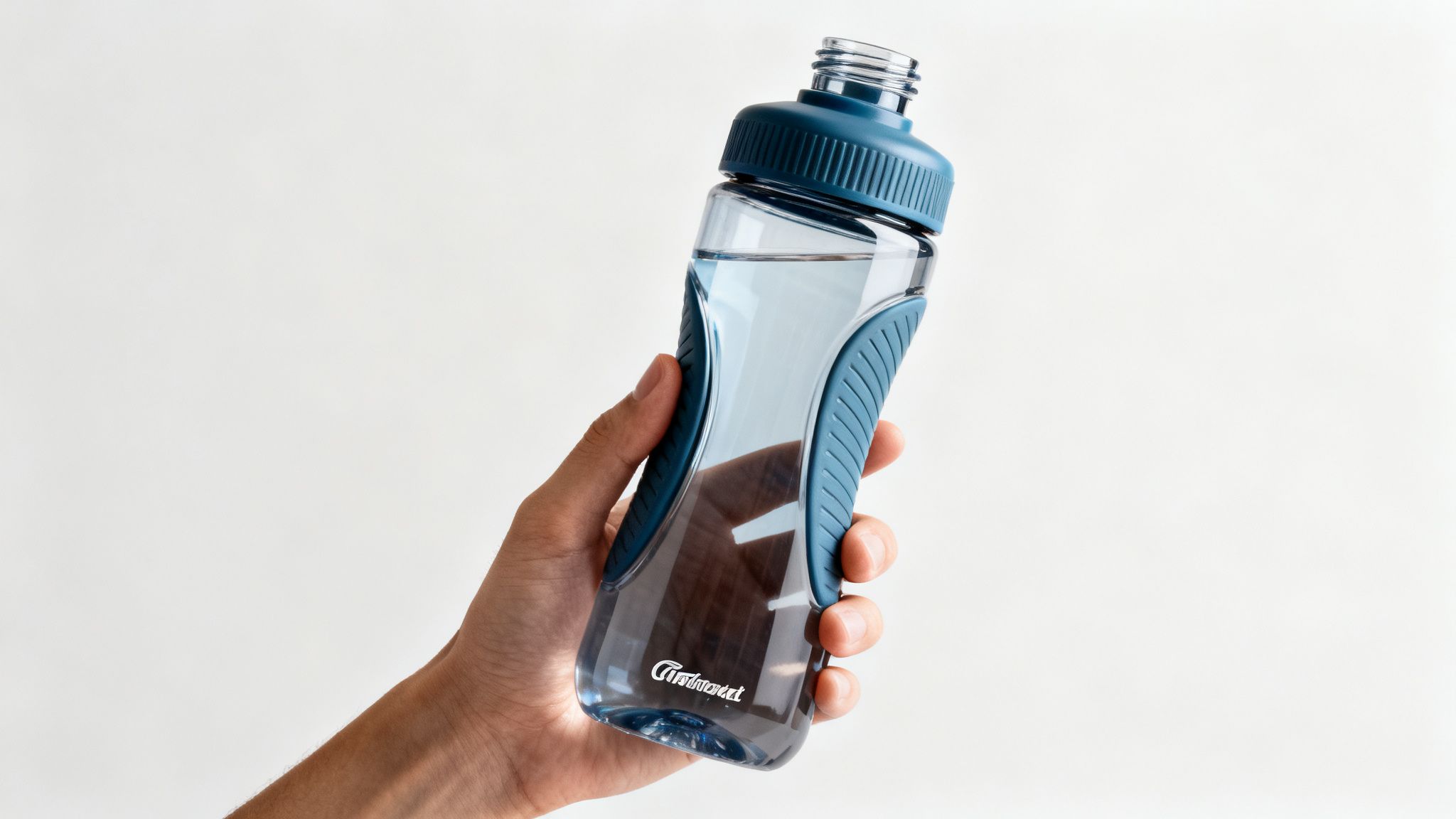 A hand holds a clear blue promotional water bottle filled with water against a white background.