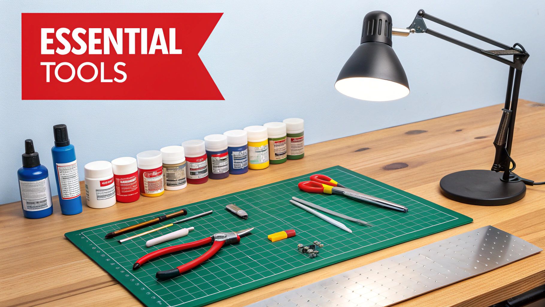 A well-organized modeler's workbench with tools and a model fire engine kit in progress