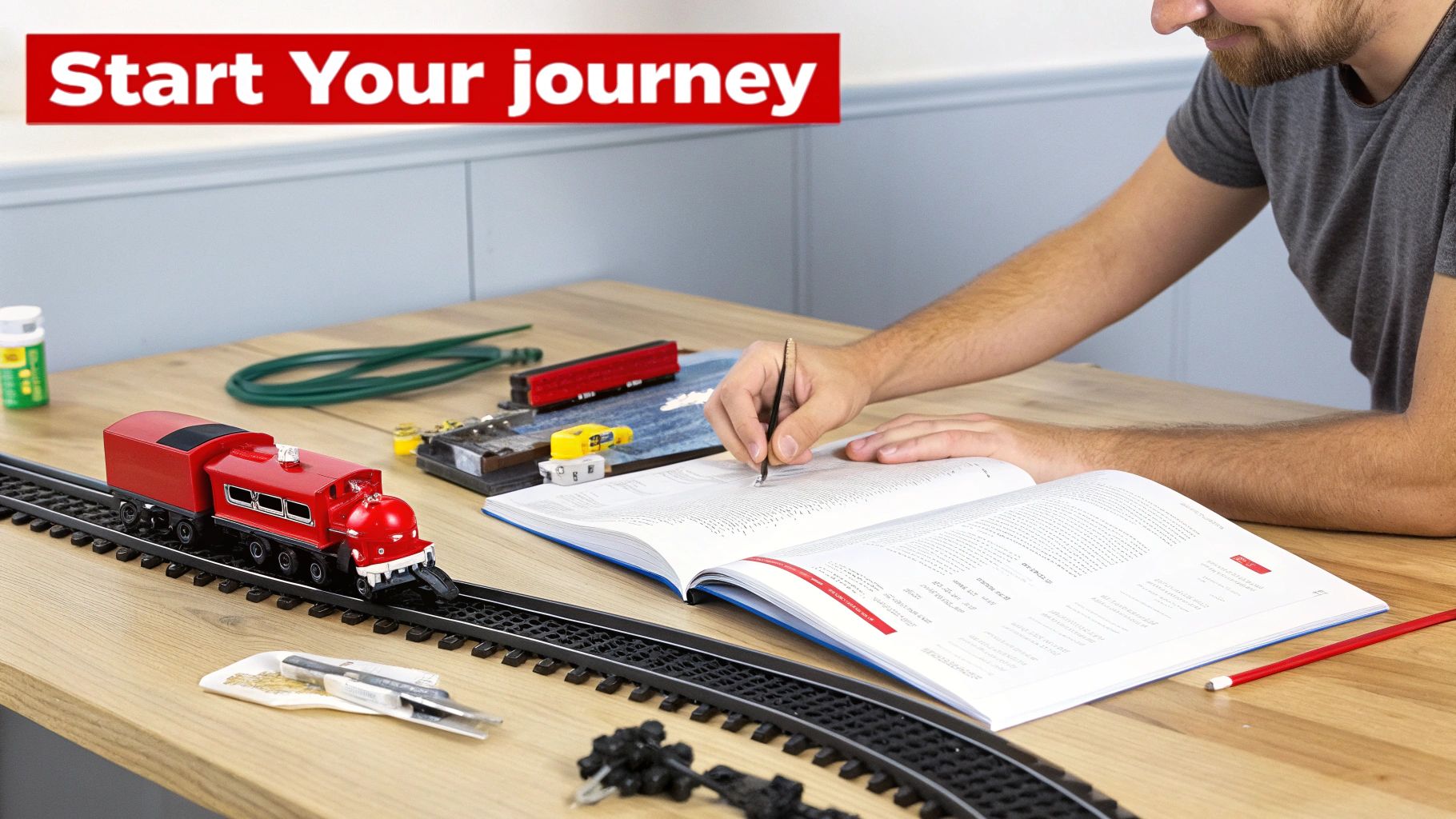 A detailed scale model train moving along a track with realistic scenery in the background.