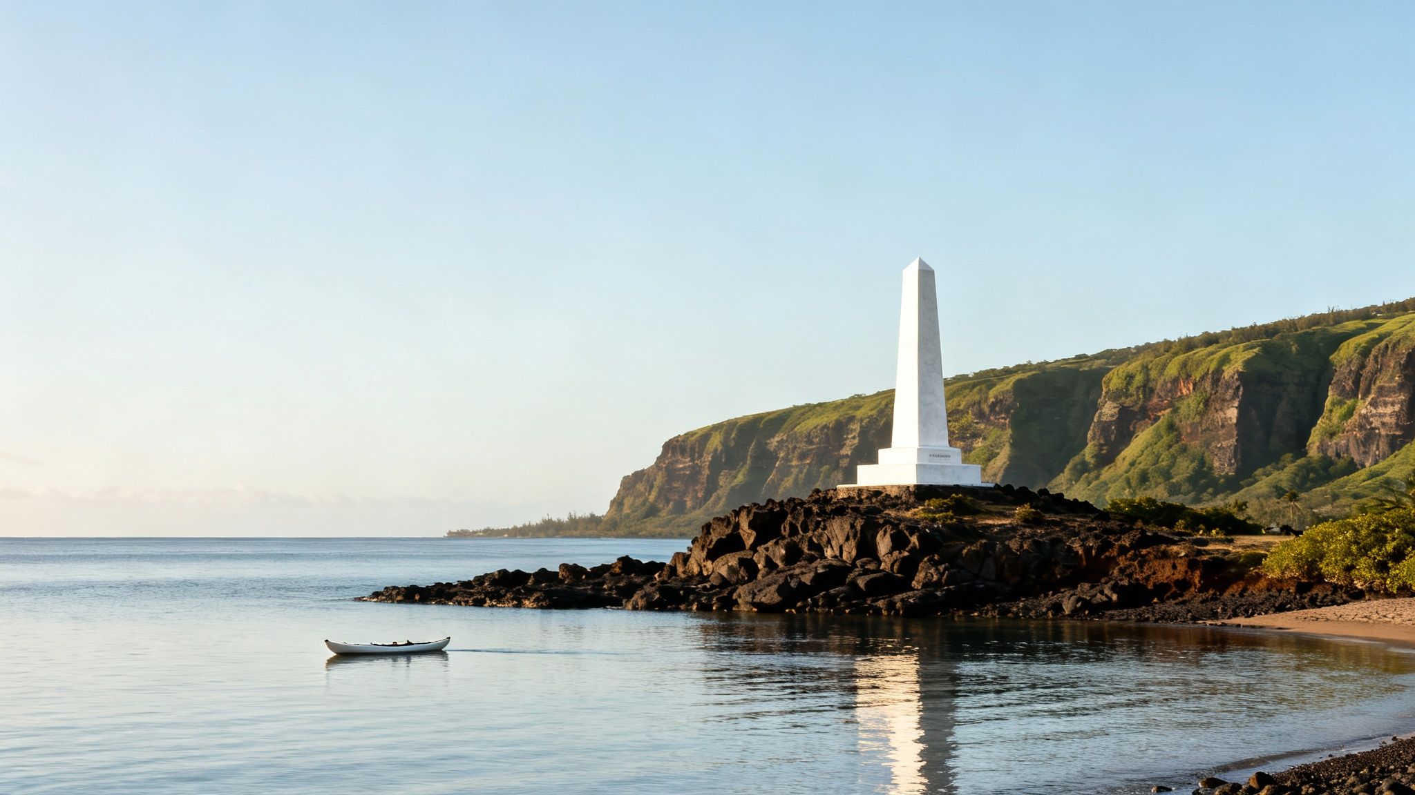 A white obelisk monument stands on a rocky coast with a small boat in calm waters and lush green cliffs.