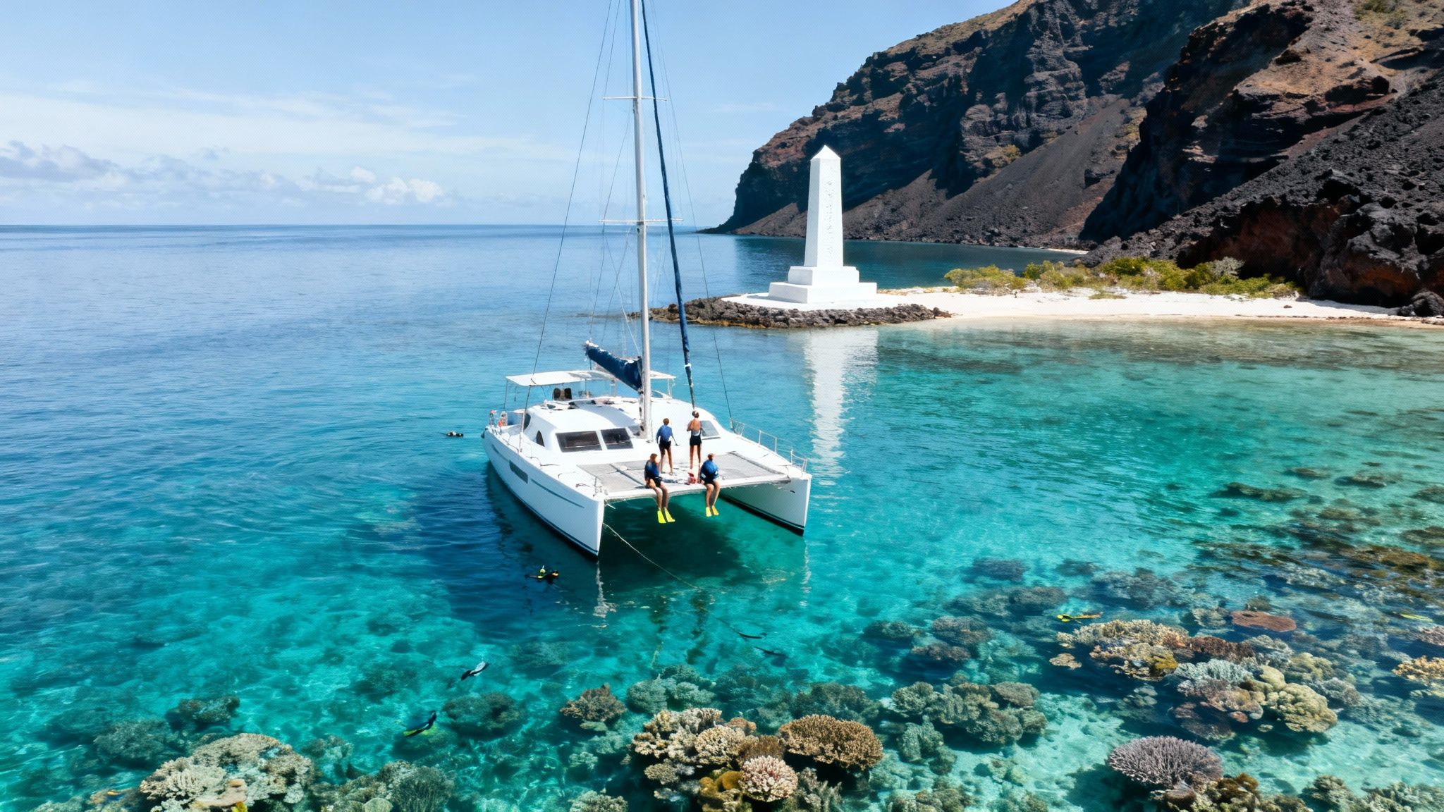 Snorkelers exploring a coral reef in the clear blue waters of Kealakekua Bay