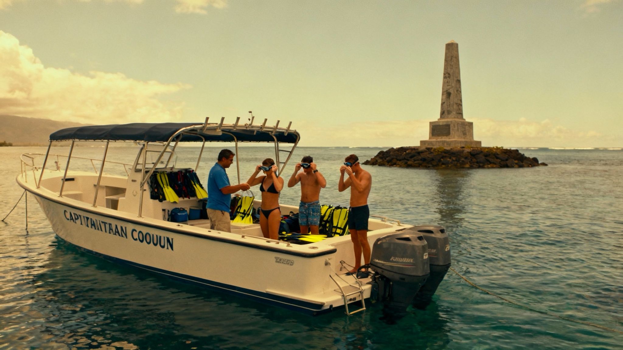 A snorkeler explores the crystal clear waters near the Captain Cook monument in Kealakekua Bay.