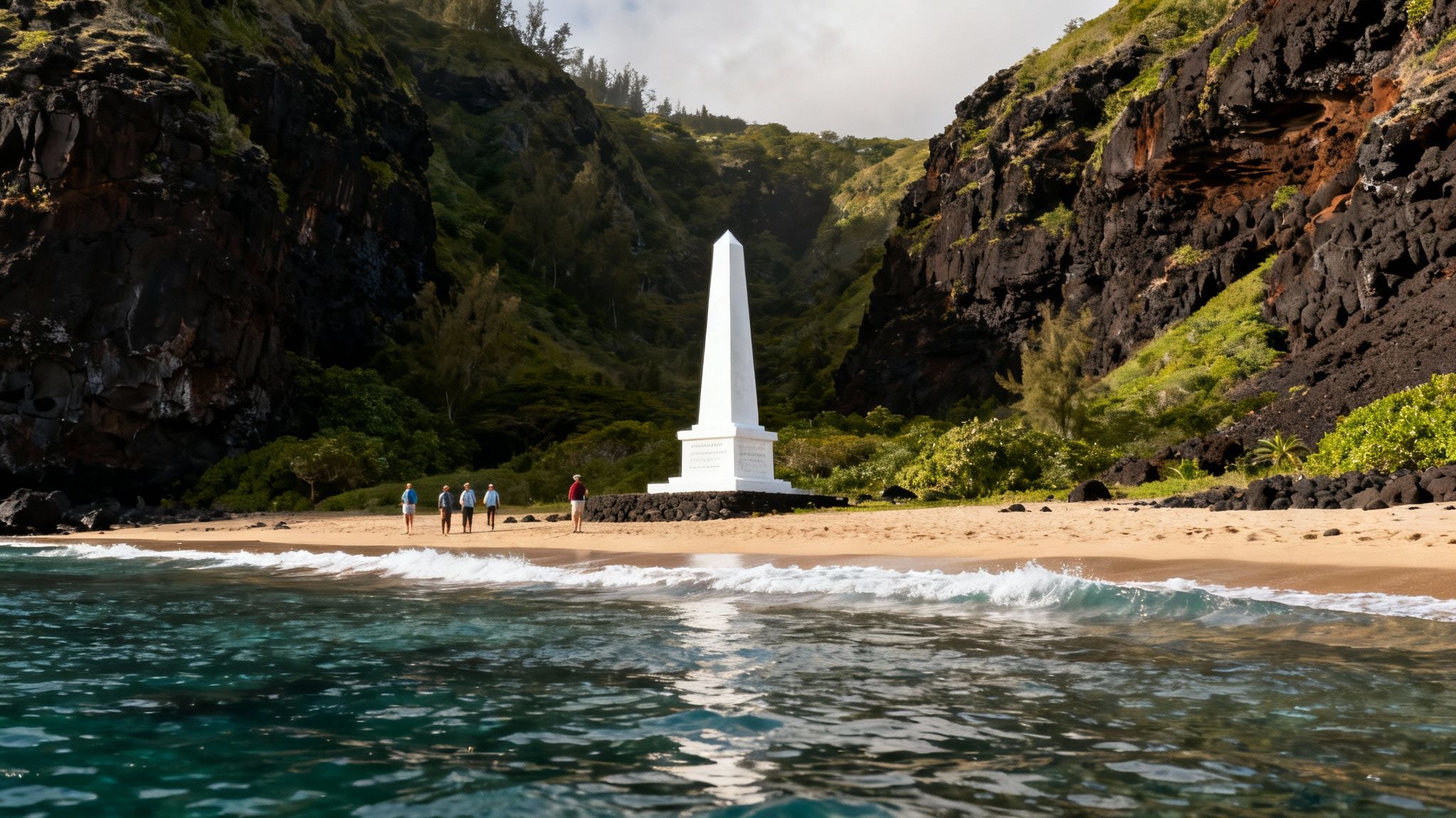 Visitors gather on a sandy beach by a white obelisk monument, framed by majestic cliffs and clear ocean water.