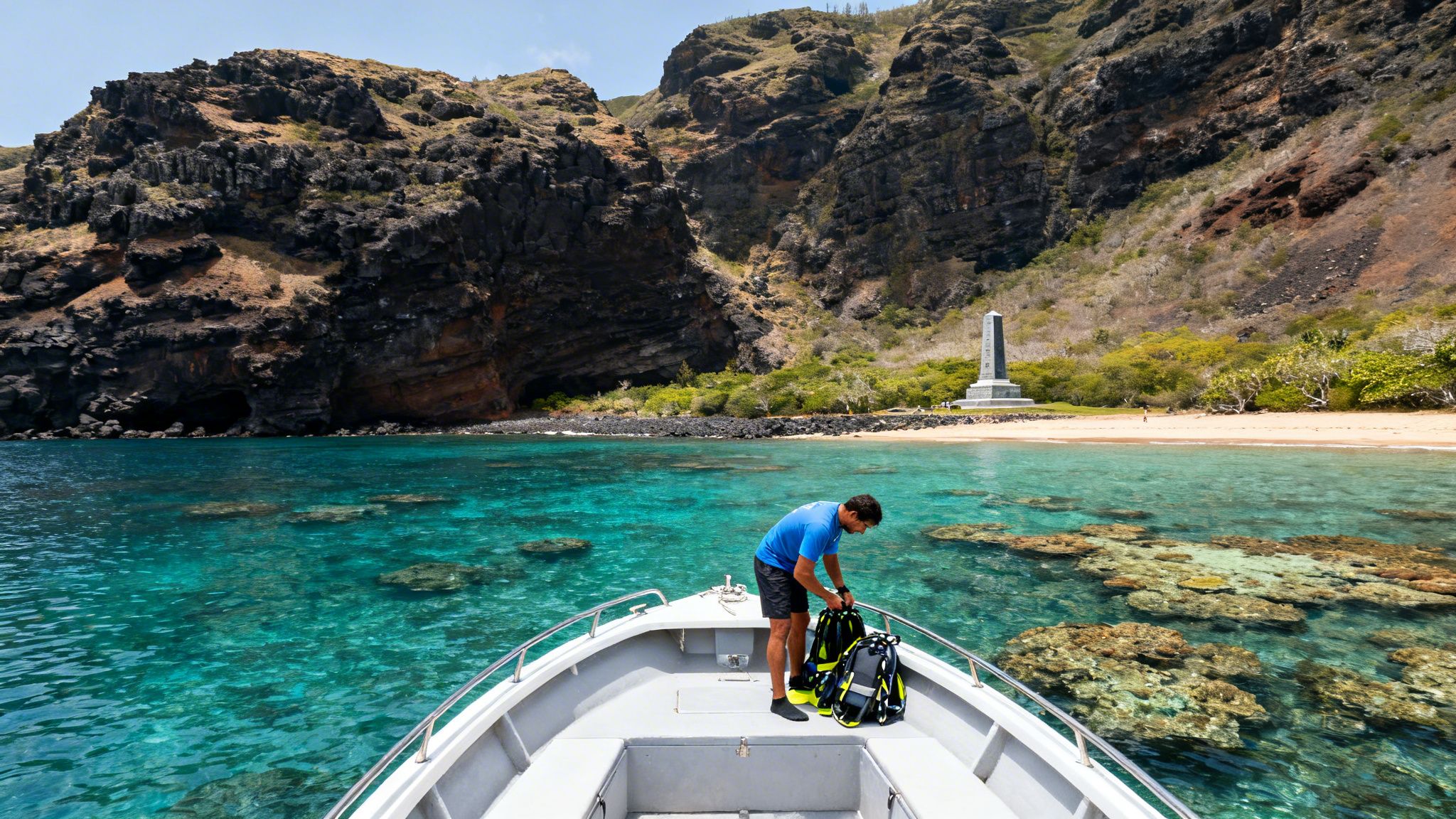 Man on a boat in clear water prepares snorkeling gear, with a beautiful island and monument in the background.