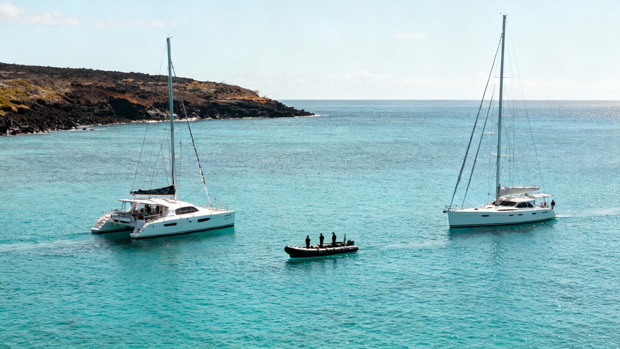 A small group enjoying a whale watching tour on a comfortable boat.