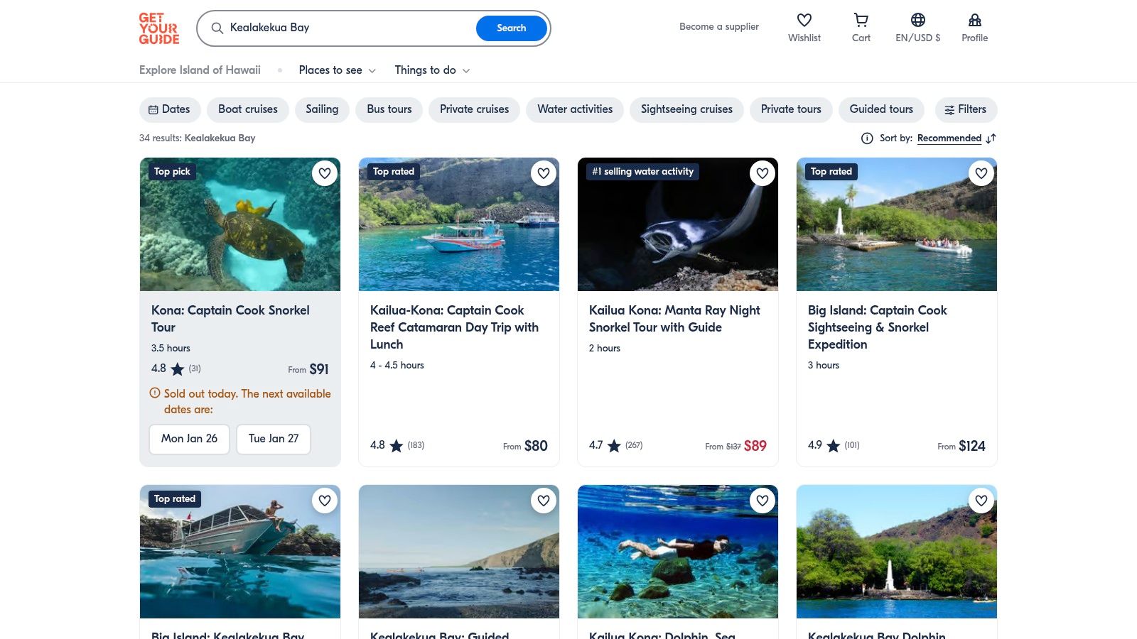 A user browsing Captain Cook snorkel tour listings on the GetYourGuide website.