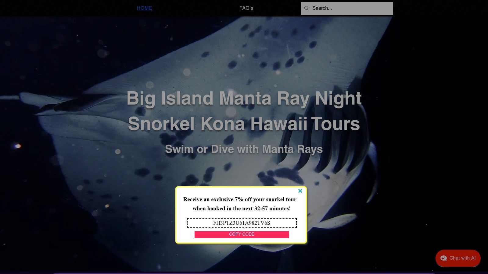 A group of snorkelers holding onto a light board at night, watching a large manta ray swim just beneath them in the illuminated water.