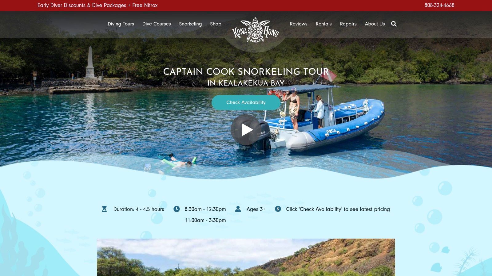 A group of snorkelers prepares to enter the water from a tour boat near the Captain Cook Monument.