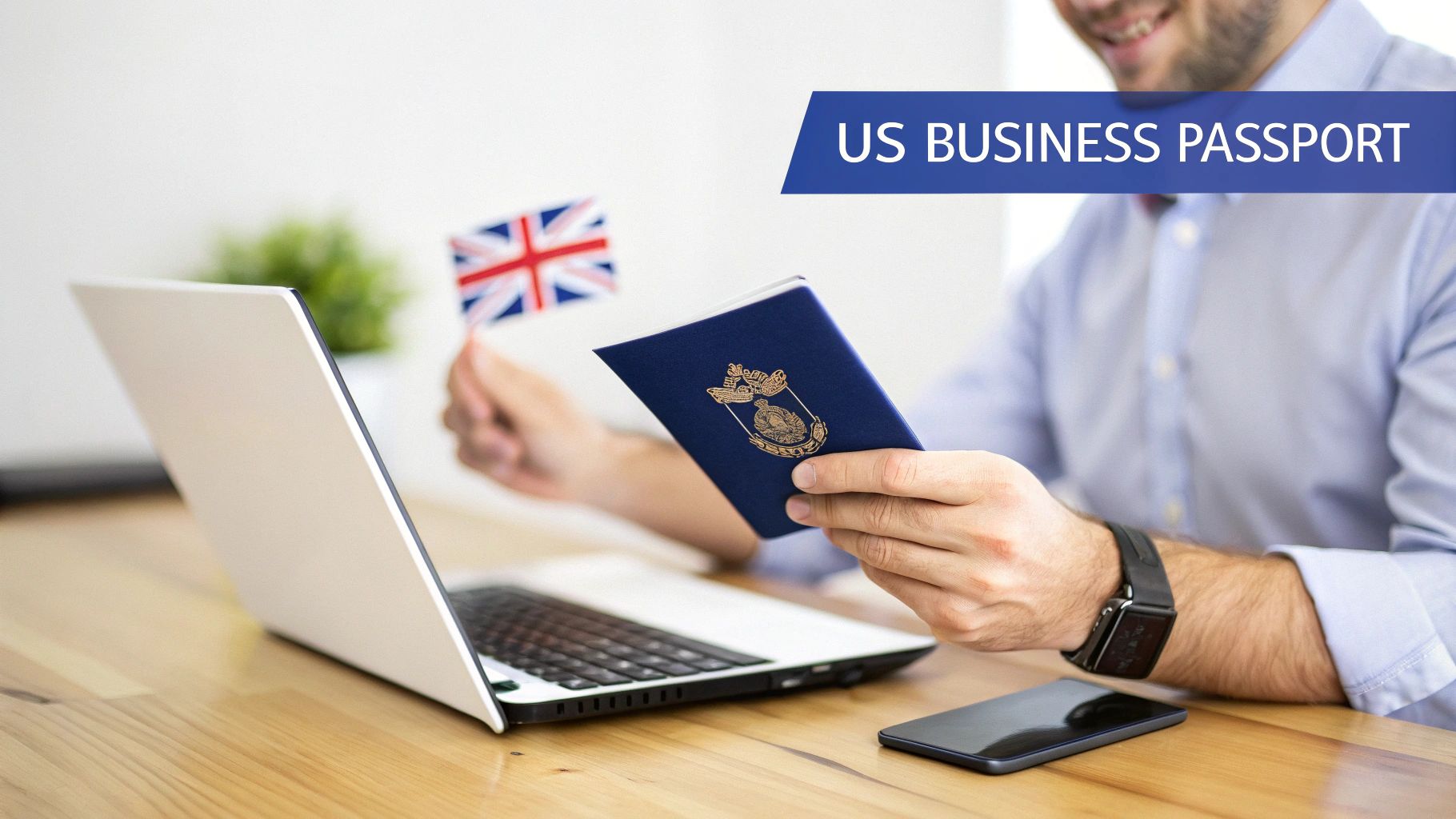 Smiling man holding a US business passport and UK flag, working on a laptop.