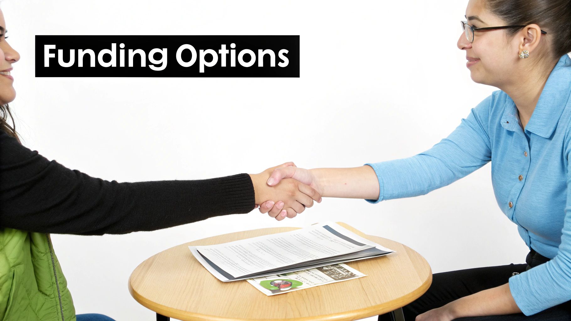 Two women shaking hands over a table with documents, next to a black box with 'Funding Options' text.