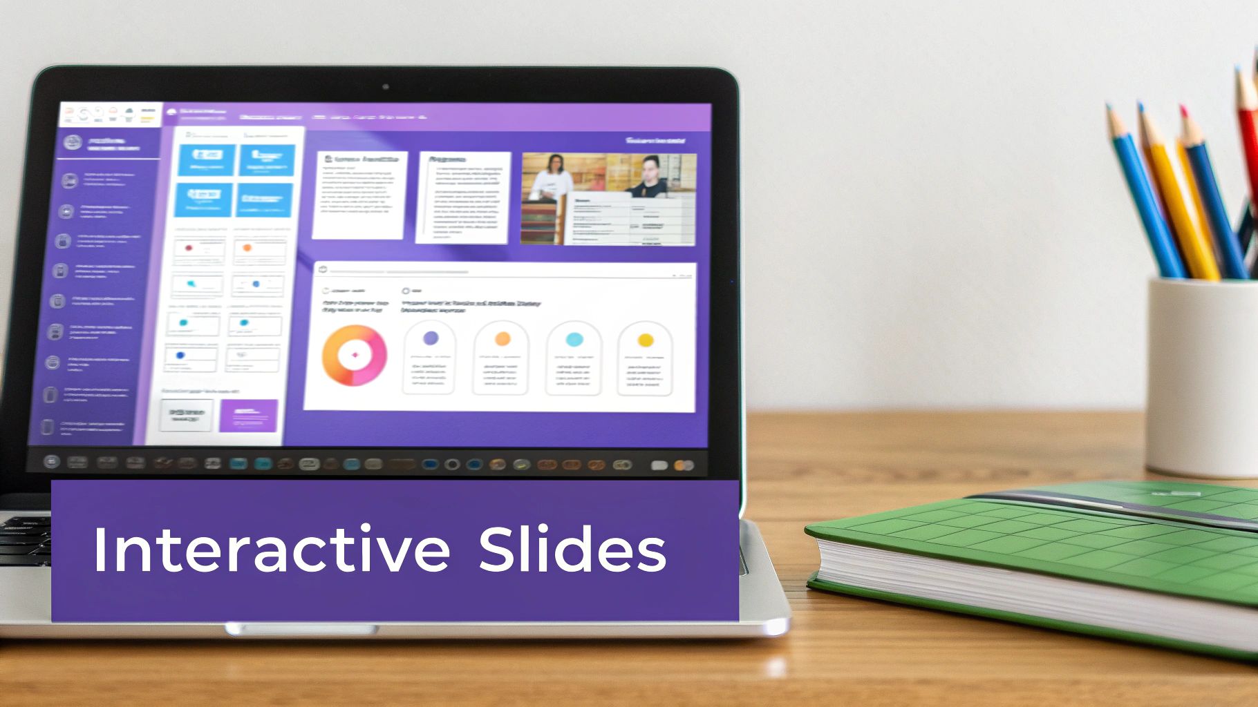 Laptop displaying interactive slides with data and images, next to colorful pencils and a green notebook.