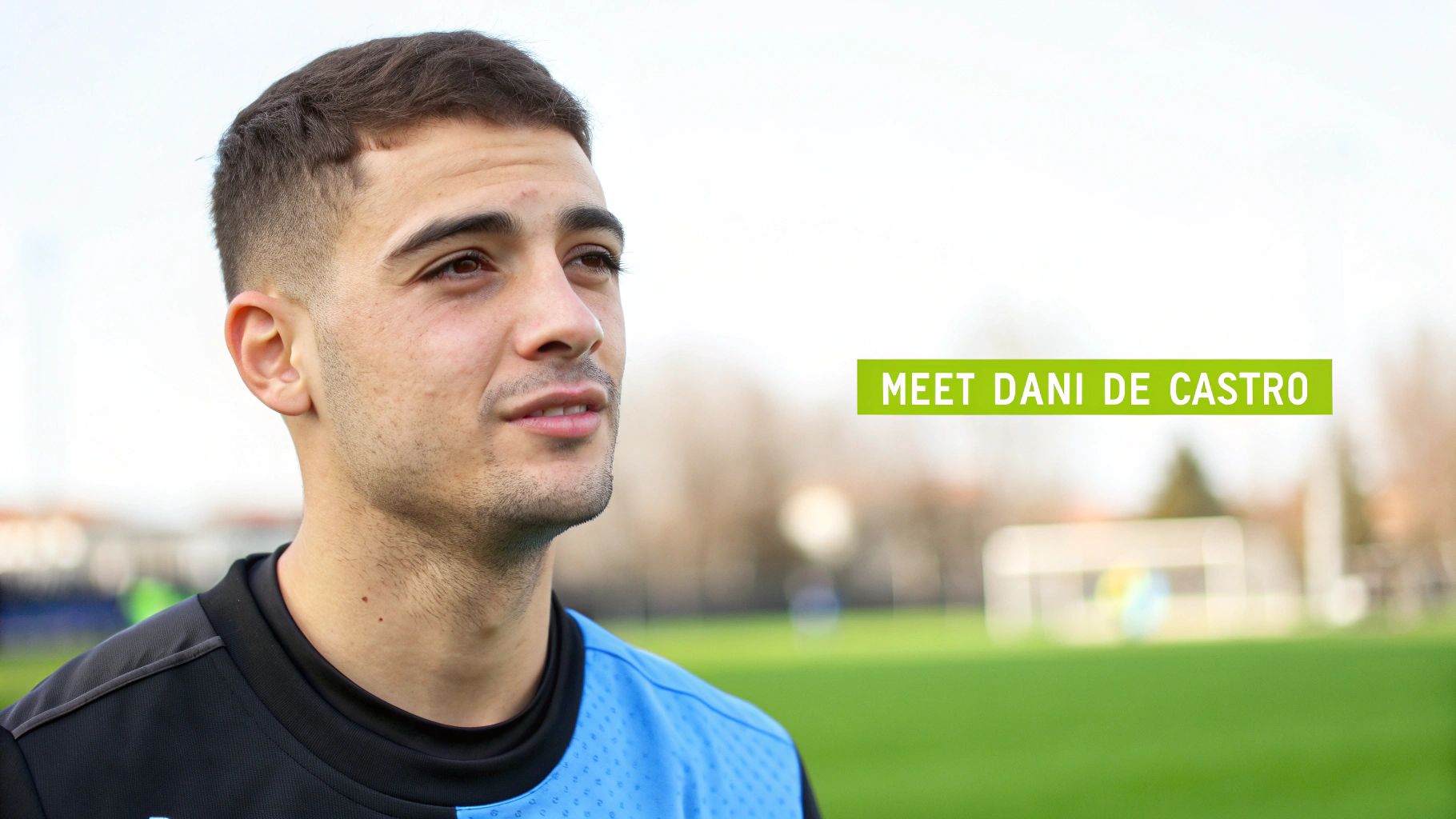 A focused Dani De Castro on the football pitch, ready for action.