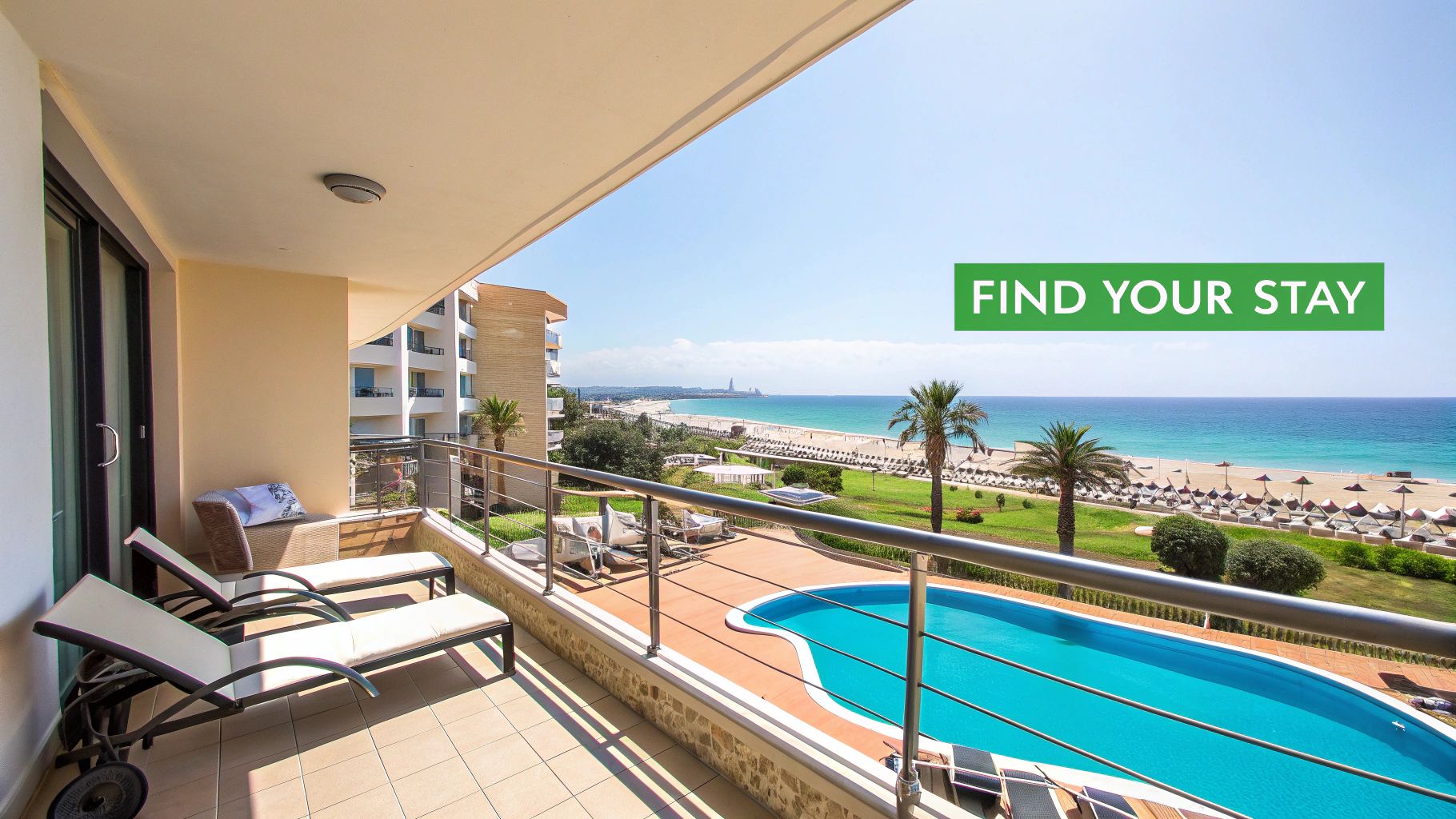 A beautiful hotel pool area overlooking Nissi Beach at sunset.