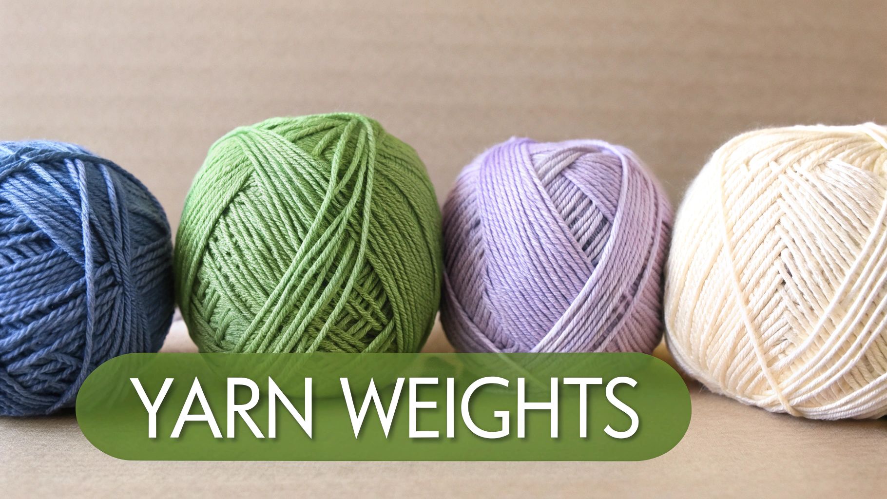 Colorful yarn skeins arranged neatly by weight category