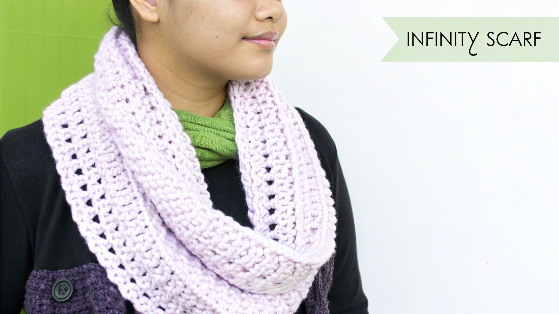 A stylish, textured infinity scarf crocheted with gray yarn.