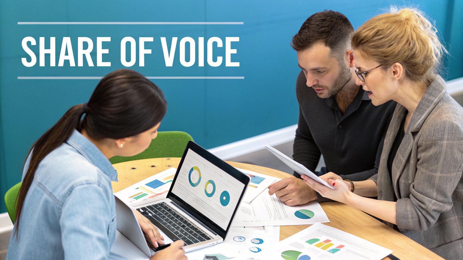 A person working on a laptop with charts and graphs in the background, illustrating the concept of data analysis and share of voice calculation.