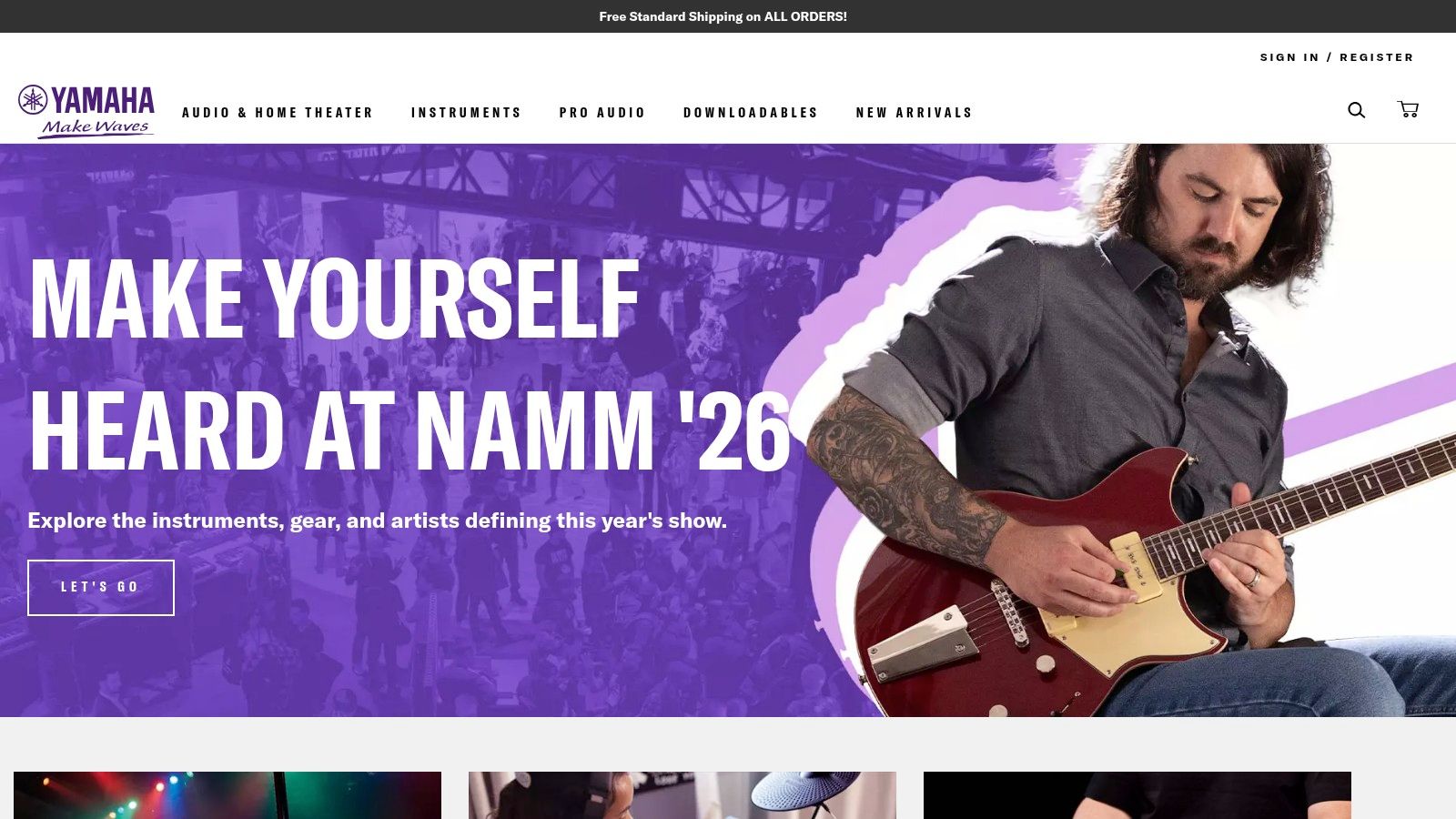 A person playing a Yamaha acoustic guitar, representing the beginner-friendly instruments available on the Yamaha Music USA website.