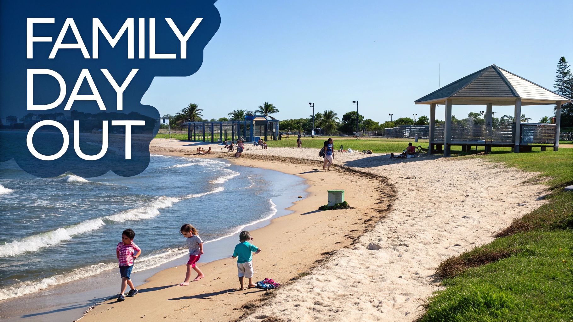 Children play by the waves on a sunny beach where families relax, enjoying a family day out.