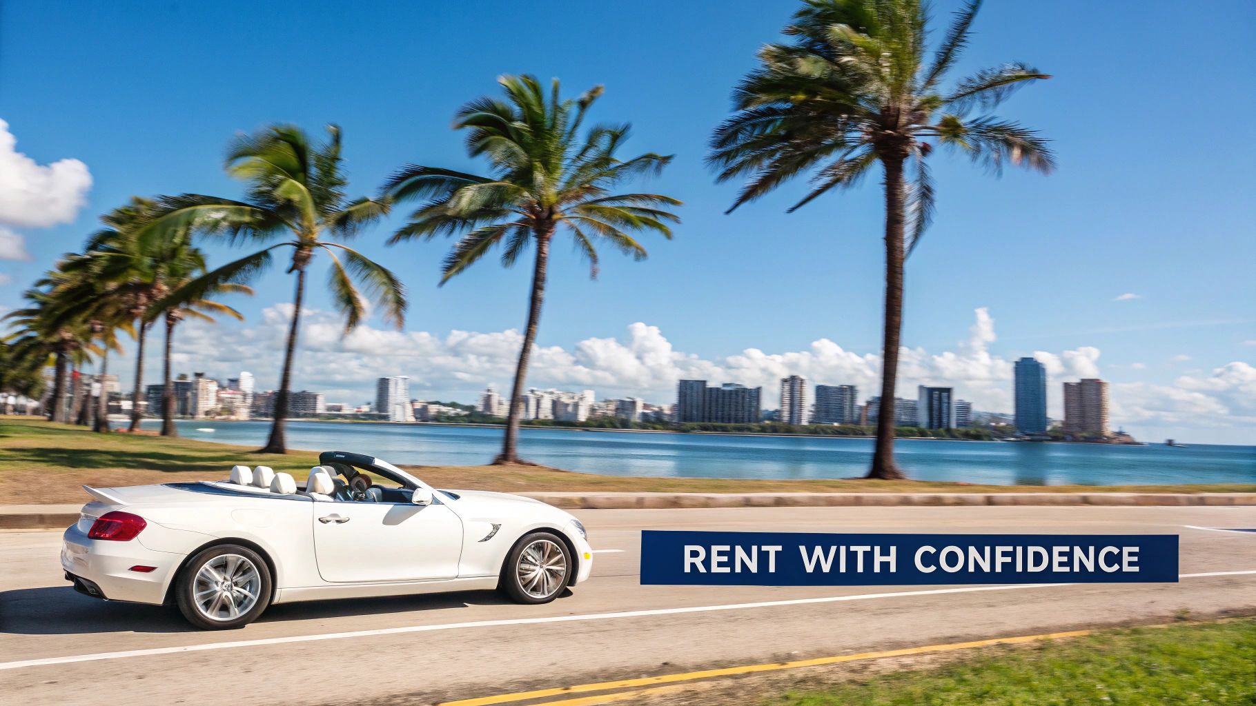 White luxury convertible driving along palm-lined coastal road in Miami Beach with ocean view