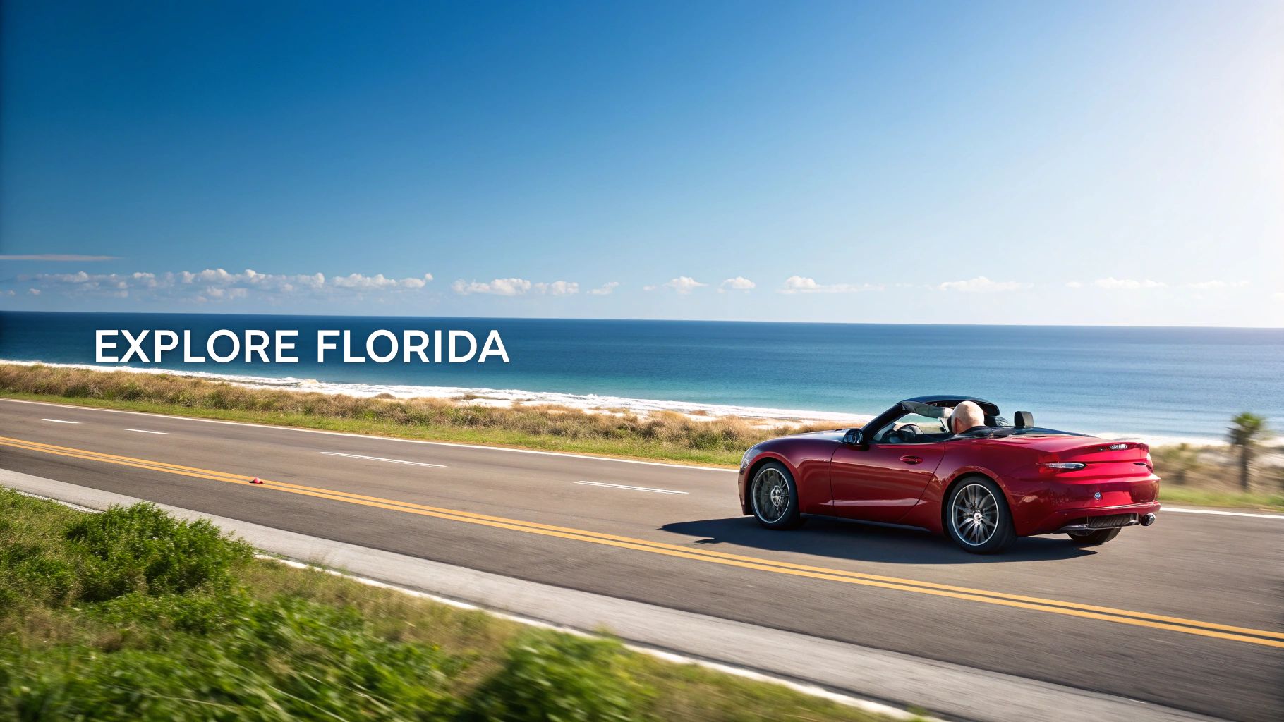 A red convertible car drives on a scenic coastal road next to the ocean with 'EXPLORE FLORIDA' text.