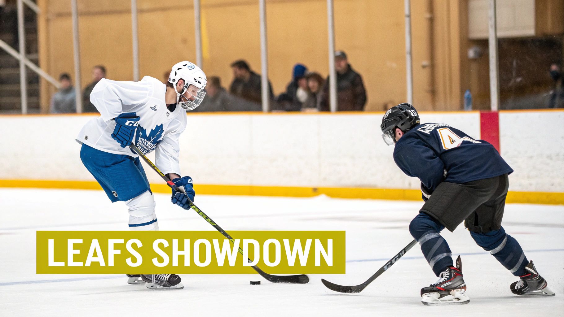 Auston Matthews and Mitch Marner of the Toronto Maple Leafs celebrating a goal on the ice.