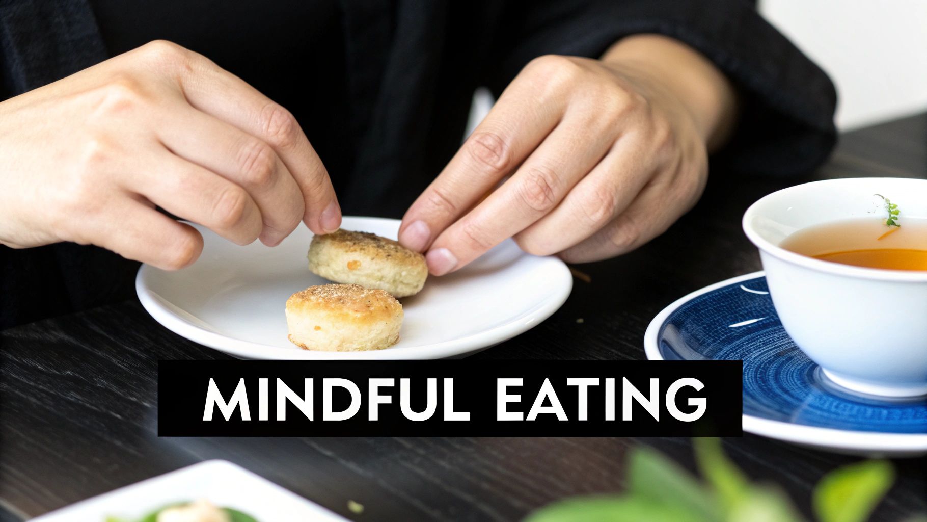 Hands carefully placing small, round pastries on a white plate next to a cup of tea, with 'MINDFUL EATING' text.
