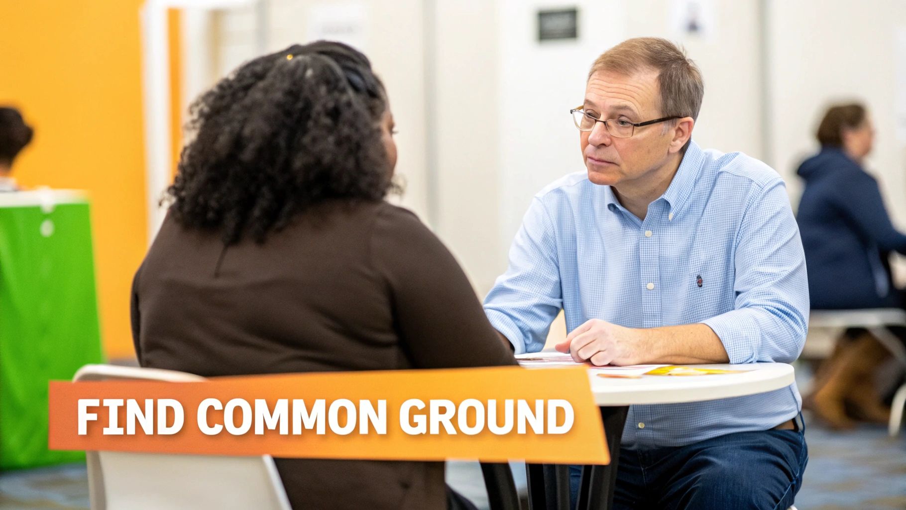 Professional counselor and client having a constructive conversation to find common ground and resolve conflict