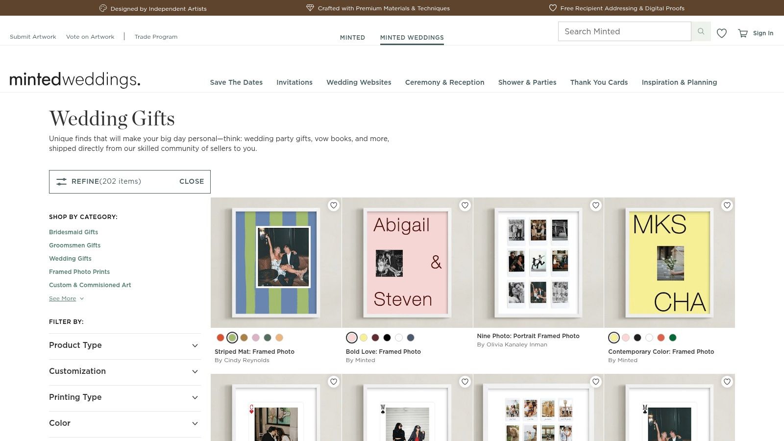 A collection of framed personalized art pieces from Minted, including a custom house portrait and a vow art print.