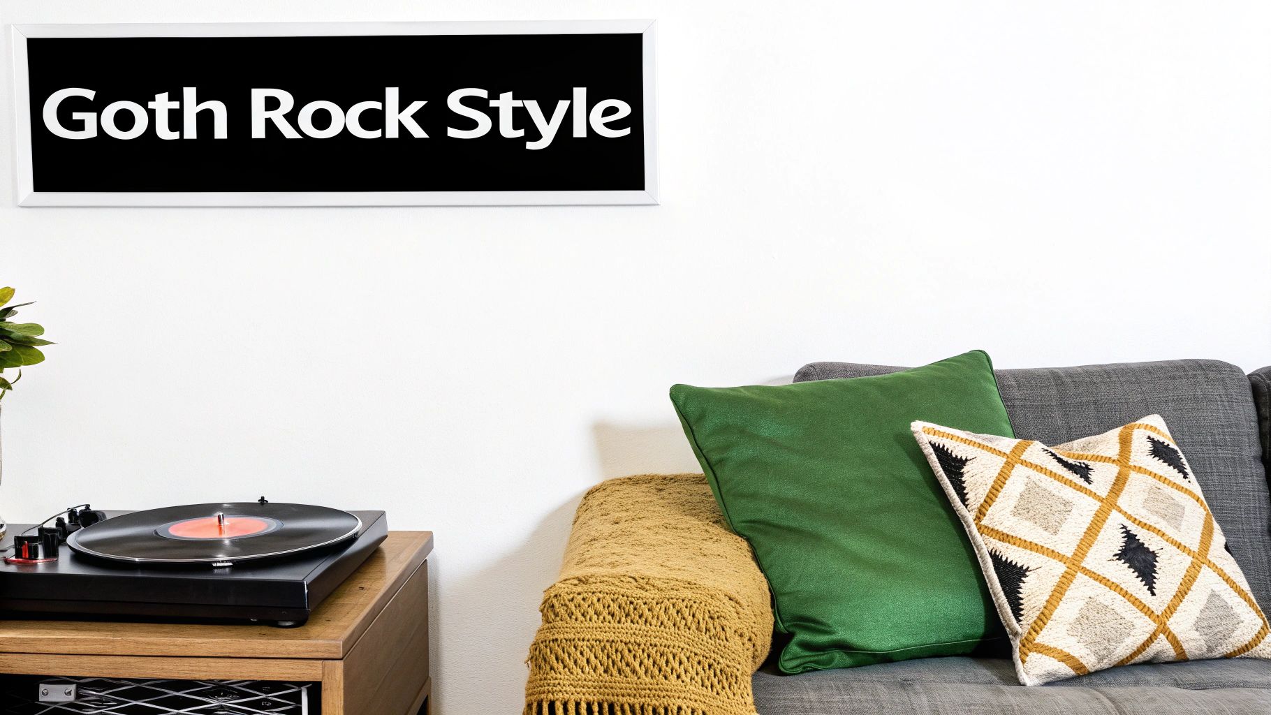 A framed "Goth Rock Style" sign hangs above a record player, a plant, and a cozy couch.