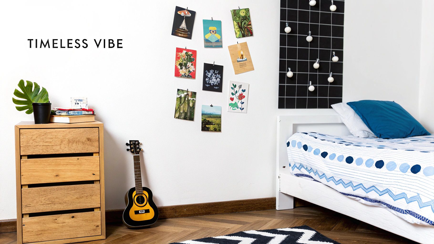 A cool kids room featuring a monochrome colour scheme with pops of colour from wall art.