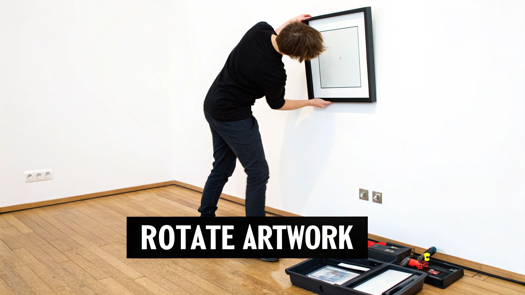 A picture wall collage in a cosy room setting, showcasing a mix of art and photos.