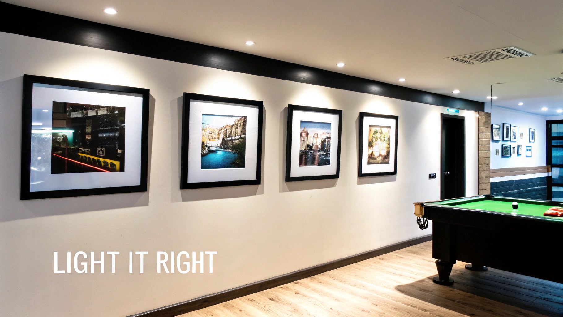 Gallery wall with four illuminated framed art prints in a modern game room setting.