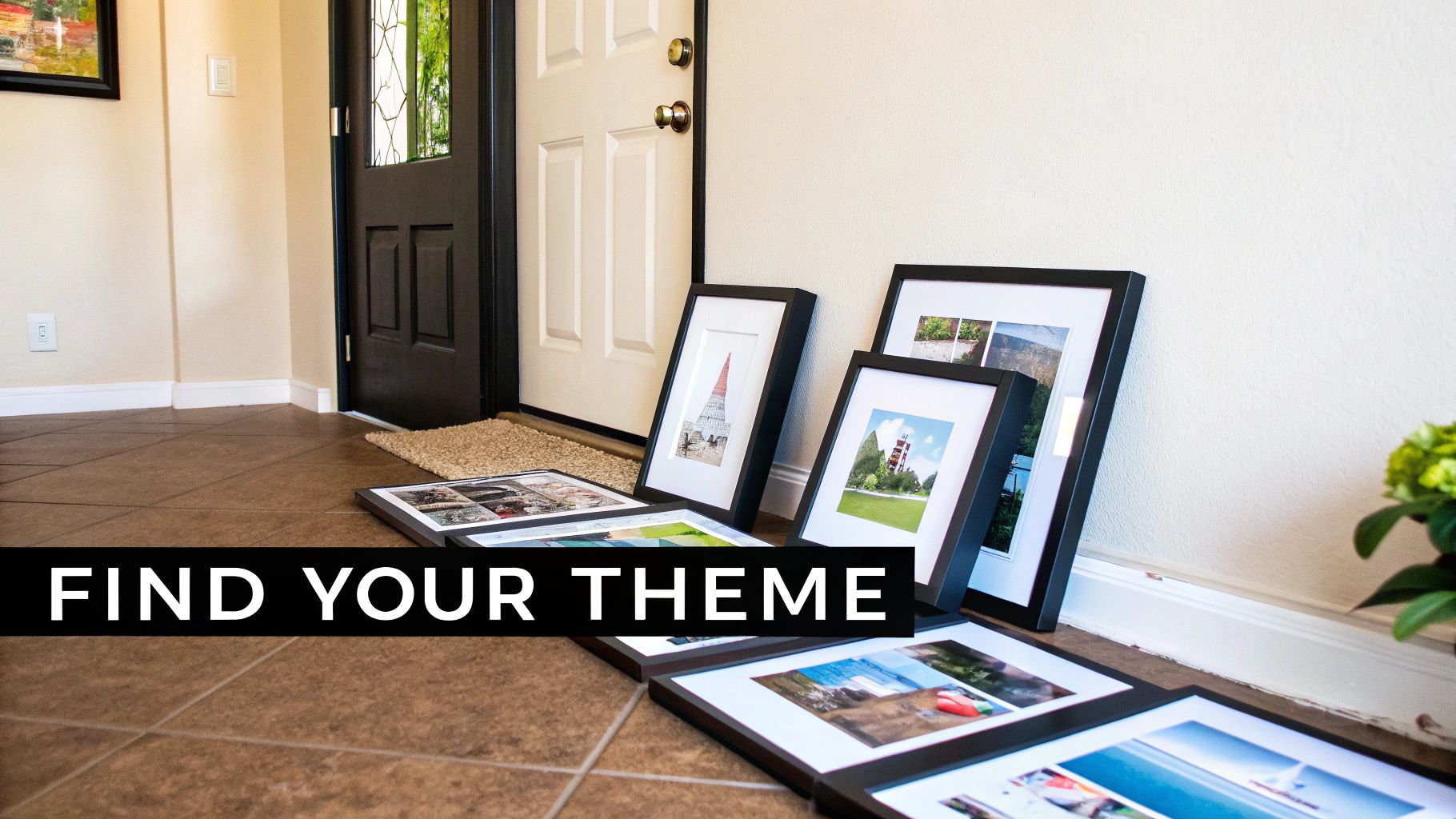 Framed pictures of diverse themes are ready for display, leaning against a hallway wall and on the floor.
