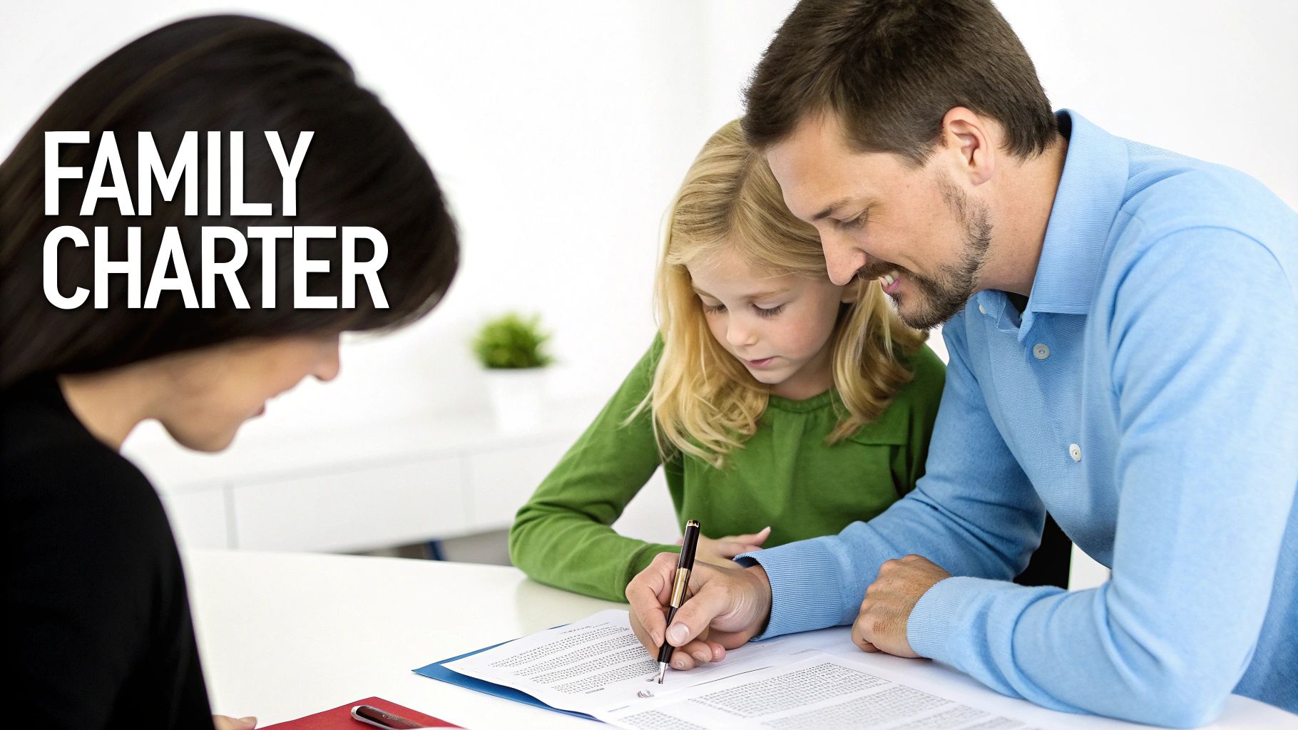A father and daughter collaboratively signing a document labeled 'Family Charter' at a table.