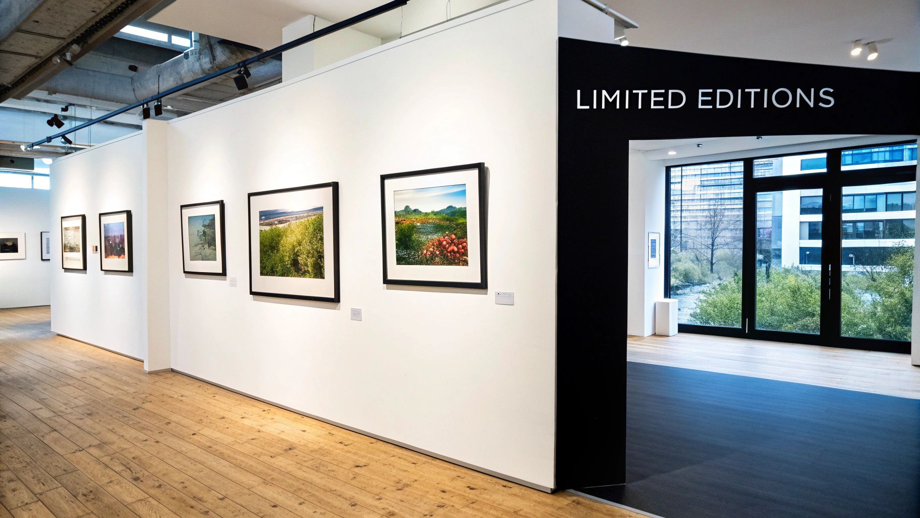 A collection of vibrant music and football-themed artwork prints displayed on a wall.