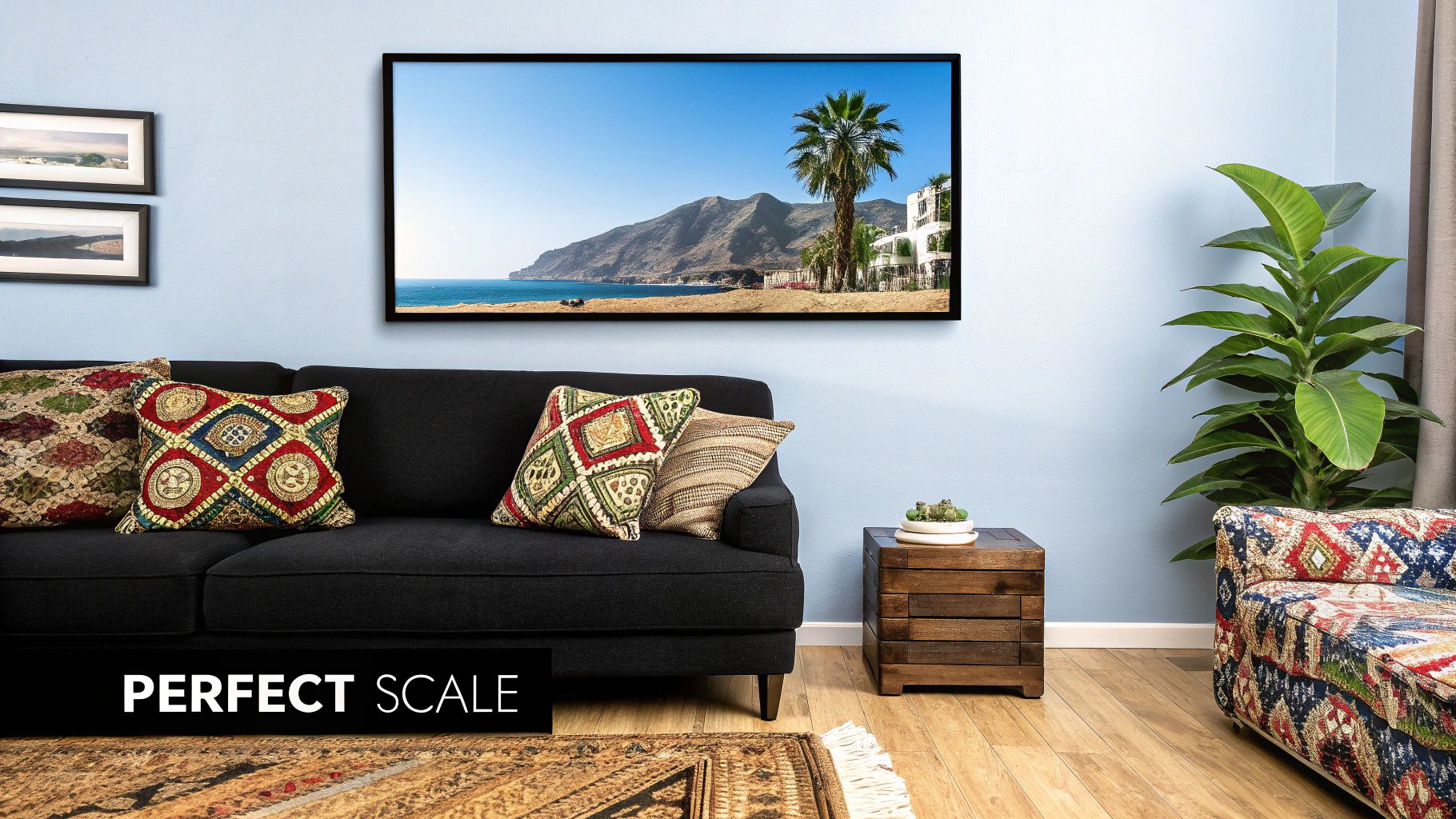 A large, bold art print hanging above a modern sofa in a well-lit living room.