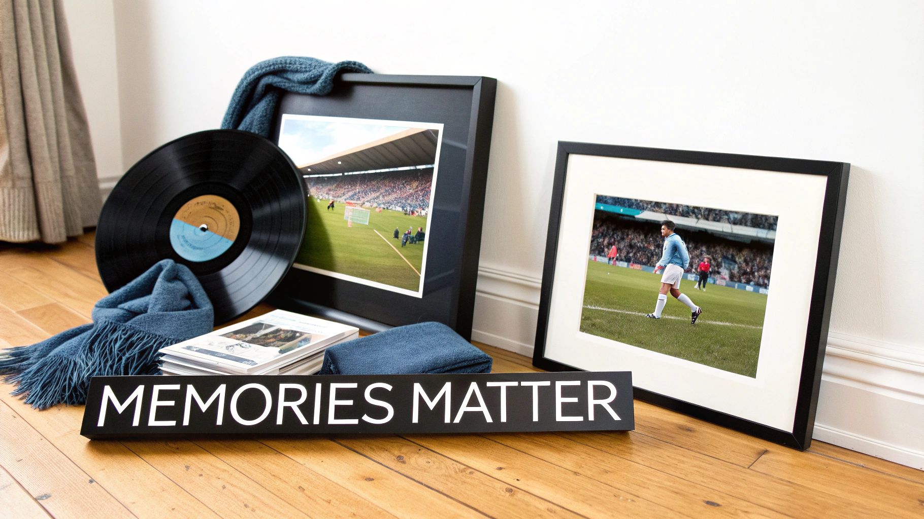 Framed football photos, a vinyl record, books, and a 'MEMORIES MATTER' sign on a wooden floor.