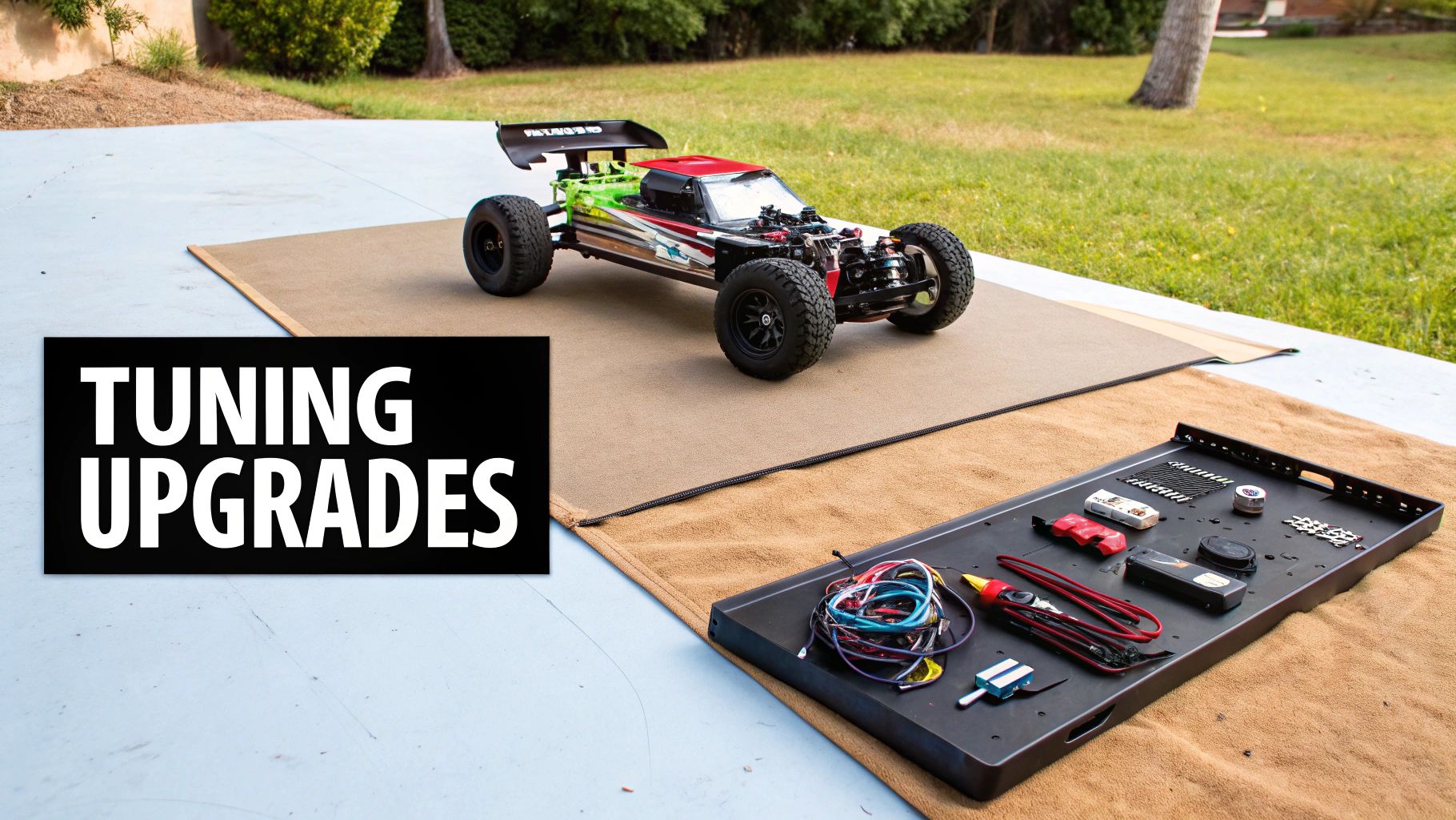 A remote control car is prepared for tuning and upgrades, surrounded by tools and parts.
