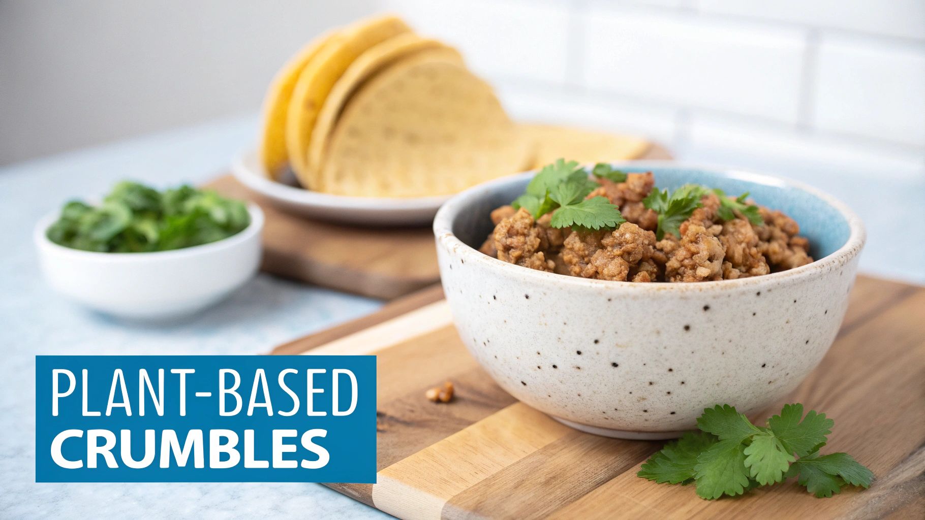 A skillet filled with freshly cooked vegetarian meat crumbles, ready to be added to a recipe.