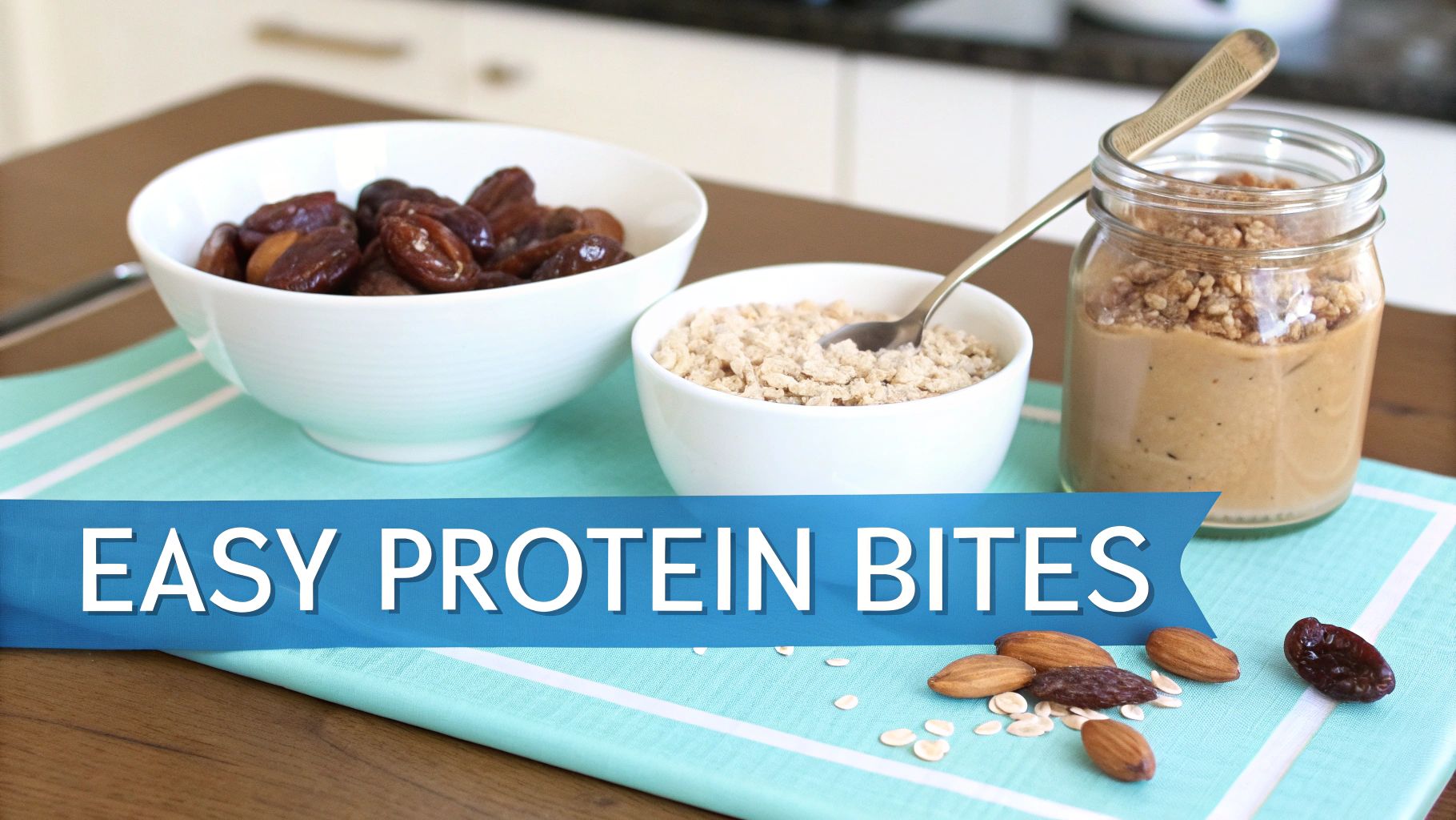 Ingredients for easy protein bites including dates, oats, almonds, and nut butter, on a striped placemat.