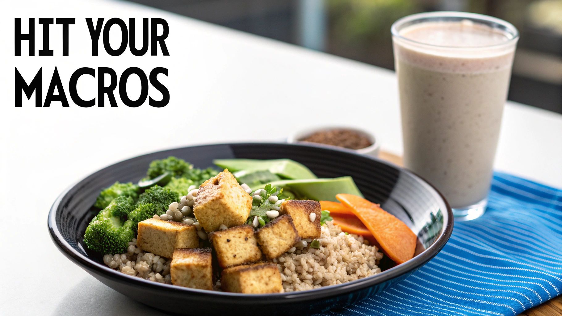 A plant-based meal featuring tofu, grains, vegetables, and a smoothie, with "HIT YOUR MACROS" text.