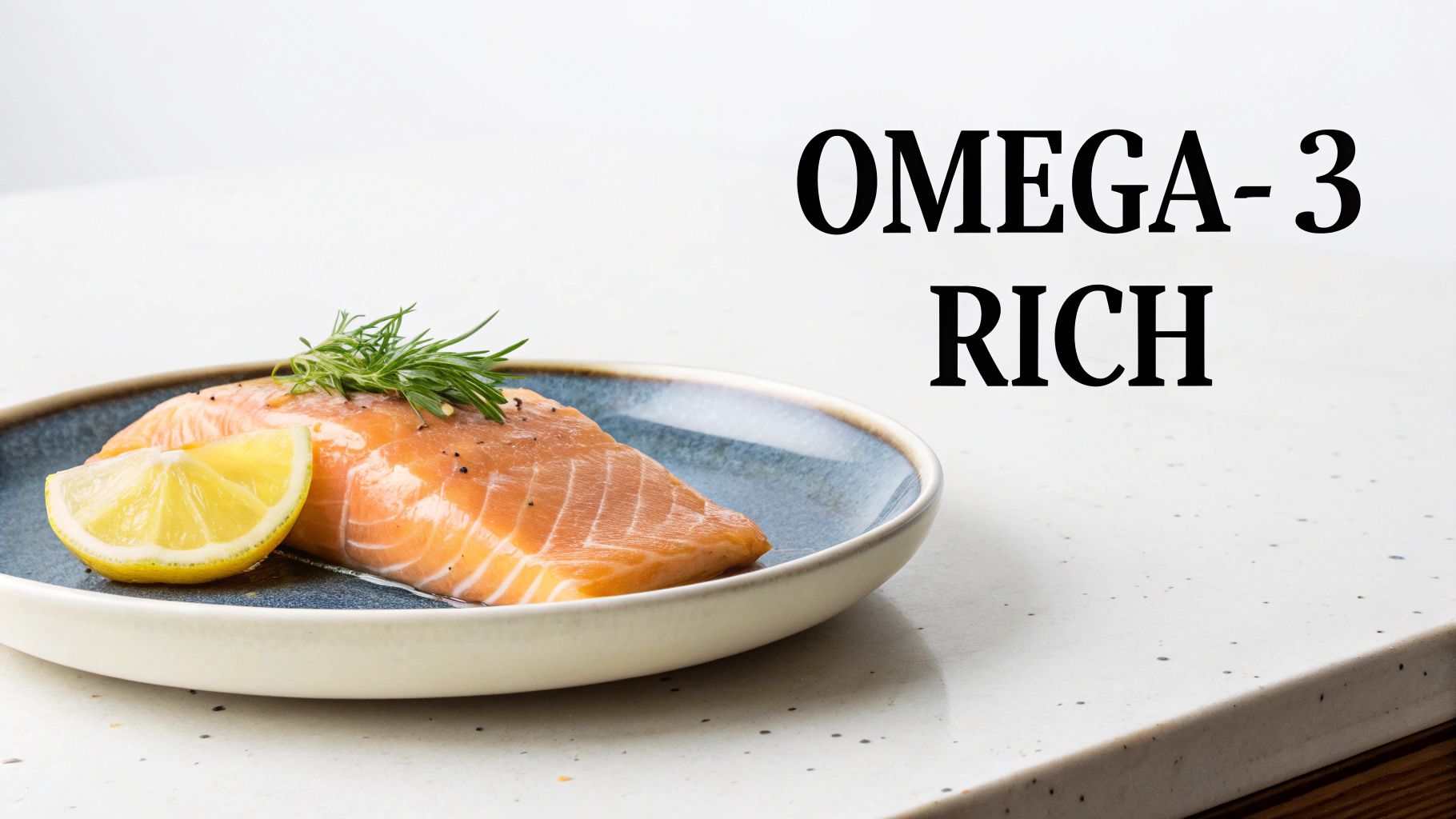 A raw salmon fillet with a lemon wedge and rosemary on a blue and white plate, labeled 'OMEGA-3 RICH'.
