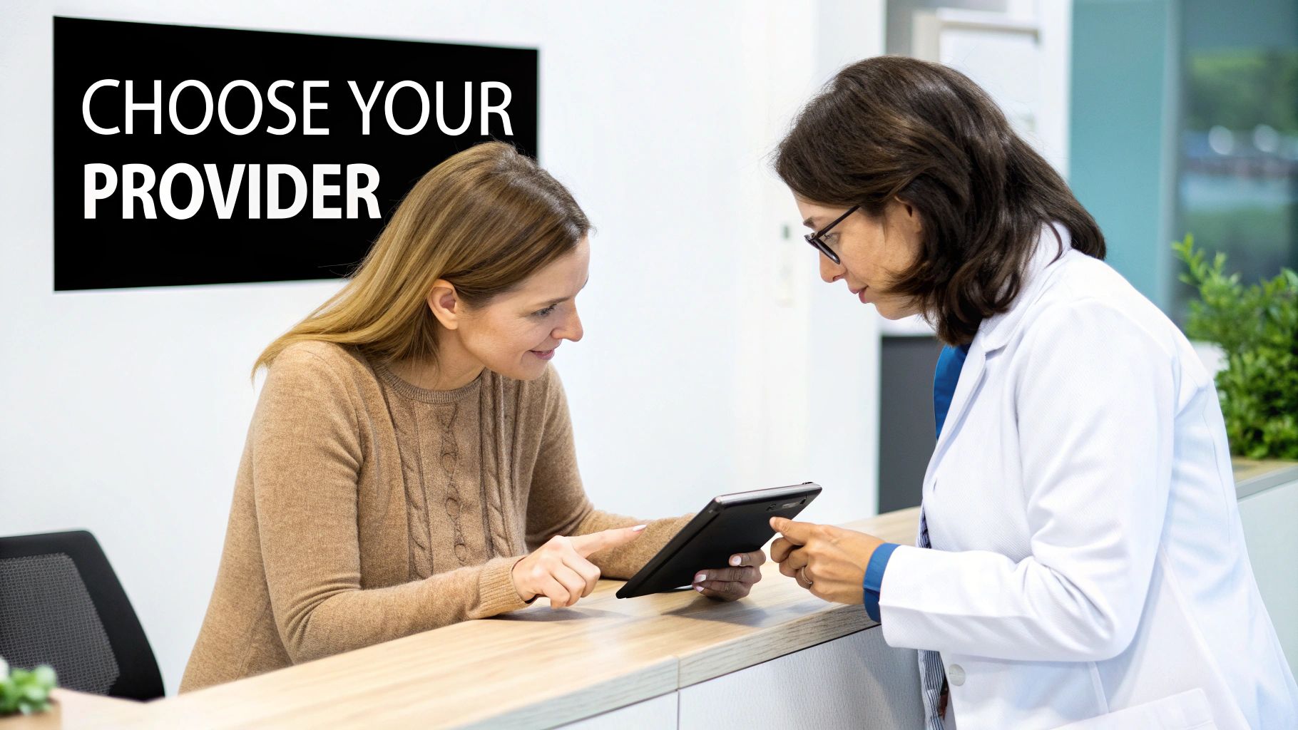 Two women, a patient and a doctor, review information together on a tablet at a clinic counter.